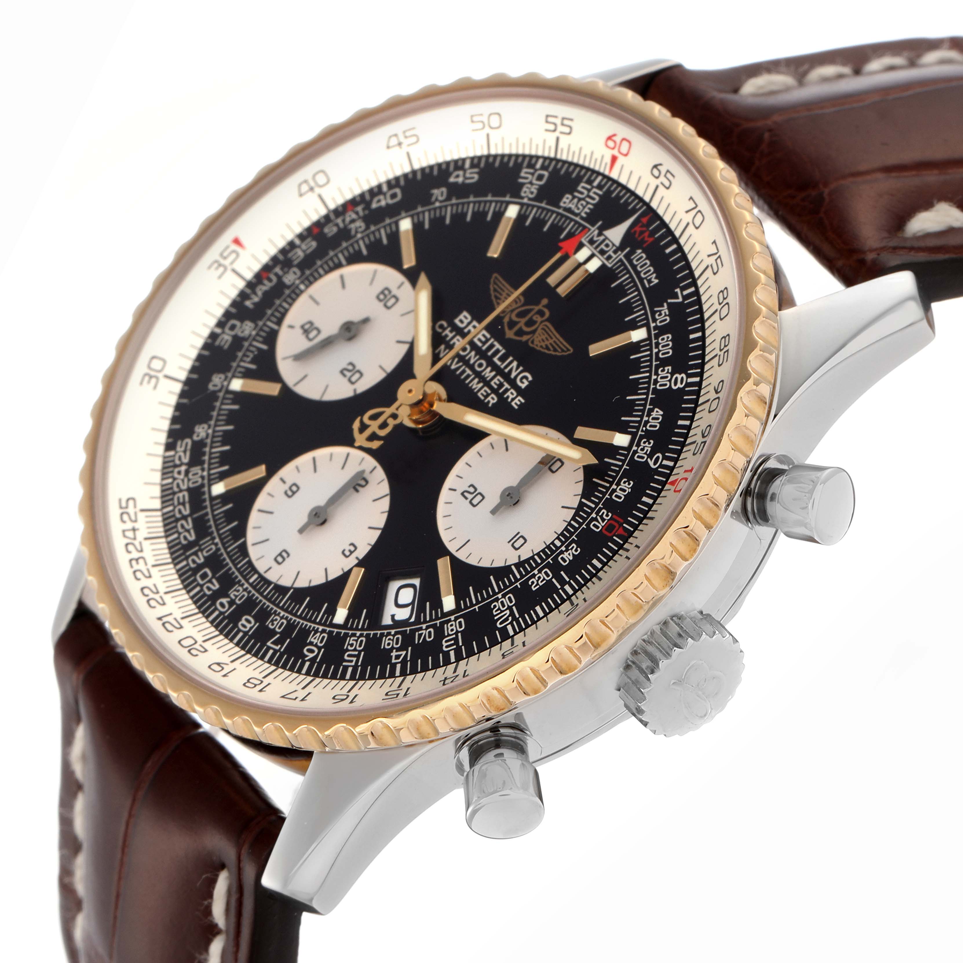 The Breitling Navitimer D23322 Men
s Steel and Gold (two tone) Black Dial D23322 Men
s Steel and Gold (two tone) Black Dial model is shown at a three-quarter angle, displaying the face, bezel, crown, pushers, and strap.