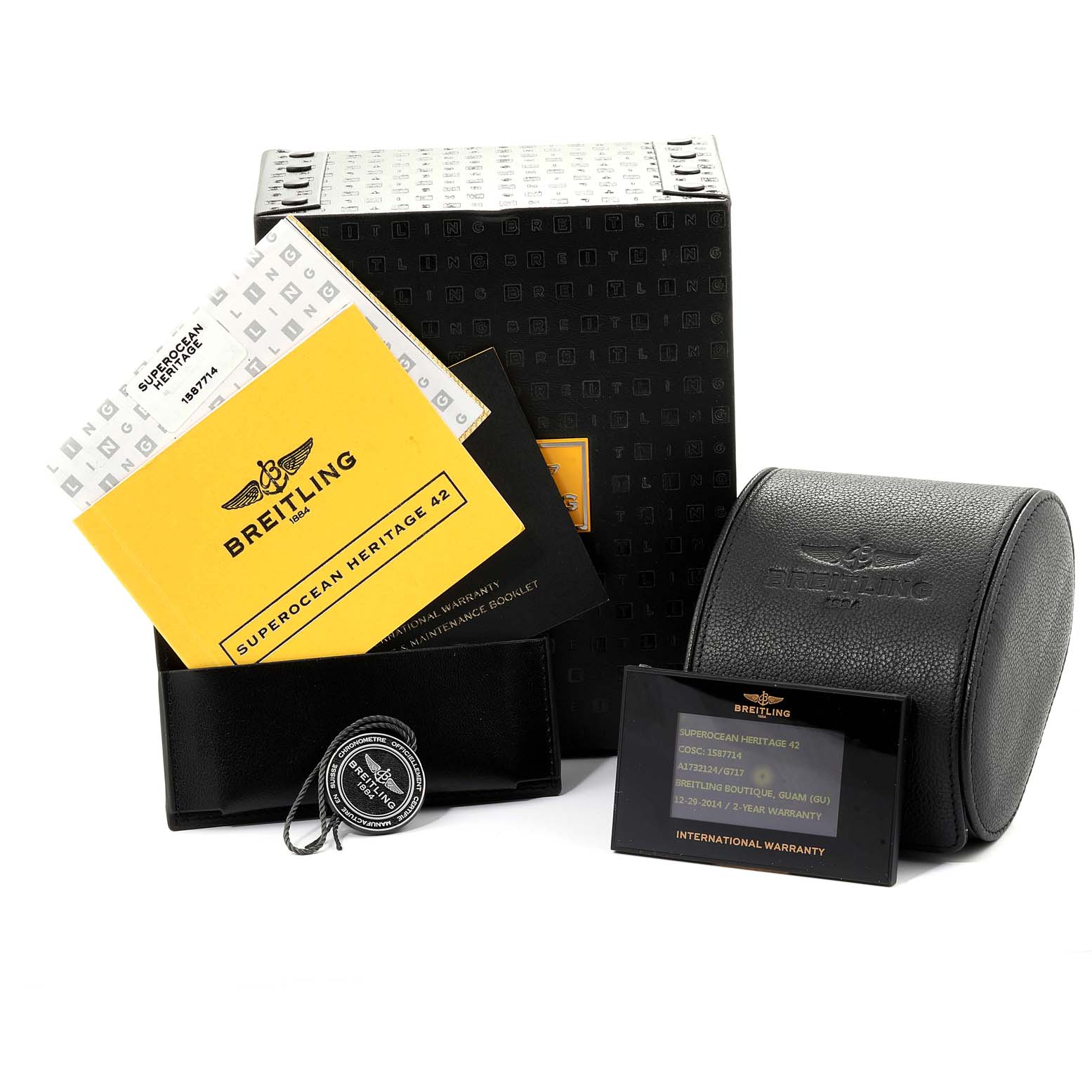 This image shows the Breitling Superocean A17321 Men's Stainless Steel Silver Dial A17321 Men's Stainless Steel Silver Dial watch box, manuals, warranty card, leather pouch, and a travel case.