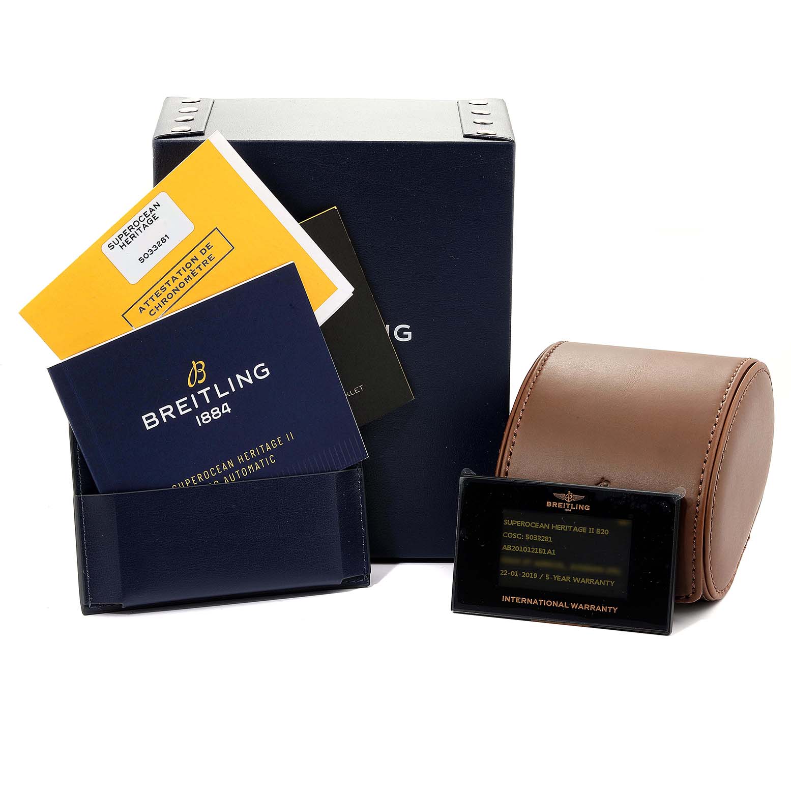 The image shows the packaging, manual booklets, and warranty card for a Breitling Superocean AB2010161C1A1 Men
s Stainless Steel Black Dial AB2010161C1A1 Men
s Stainless Steel Black Dial model.