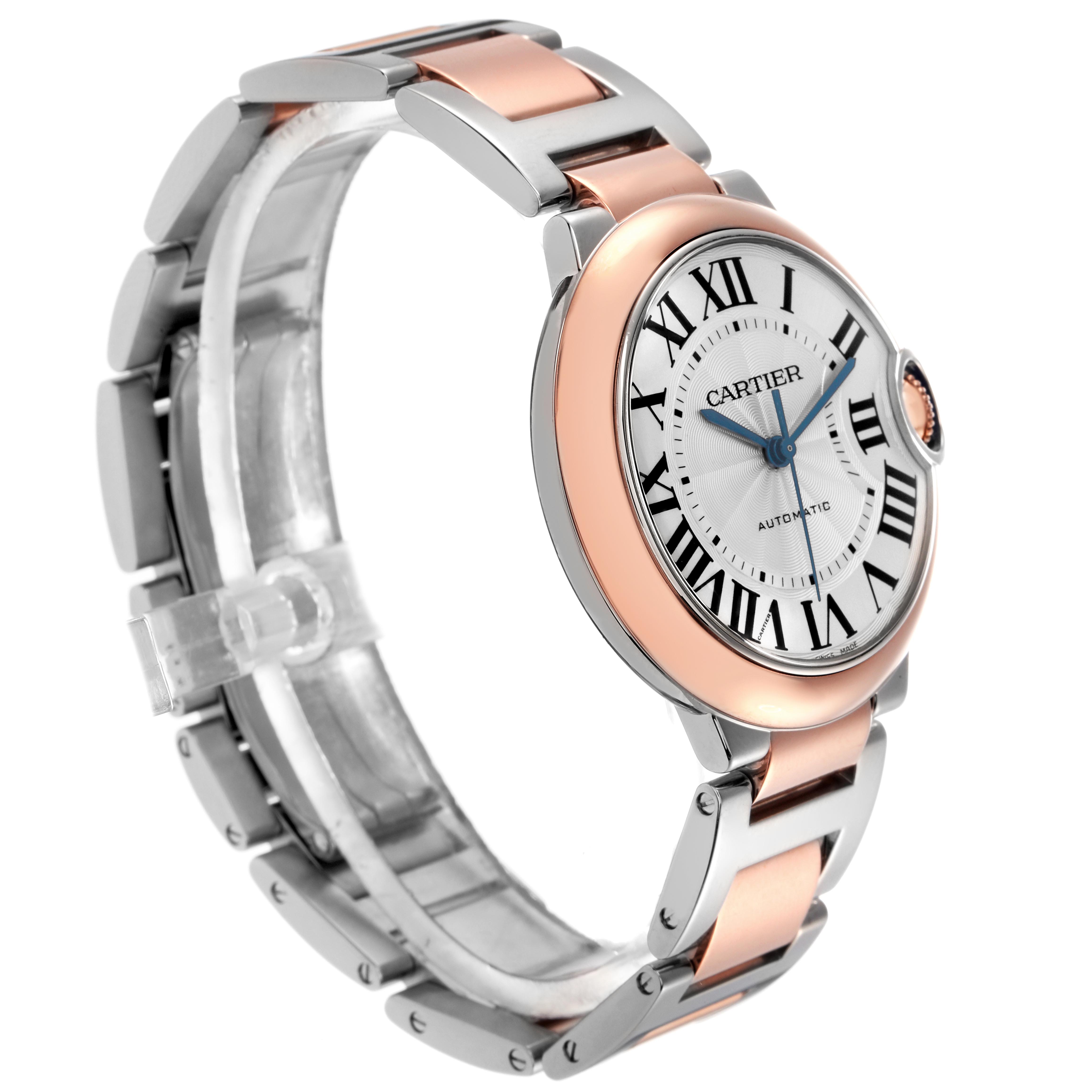 The Cartier Ballon Bleu W2BB0003 Men
s Steel and Gold (two tone) Silver Dial W2BB0003 Men
s Steel and Gold (two tone) Silver Dial watch is shown in a three-quarter angle, highlighting the dial, bezel, and two-tone bracelet.