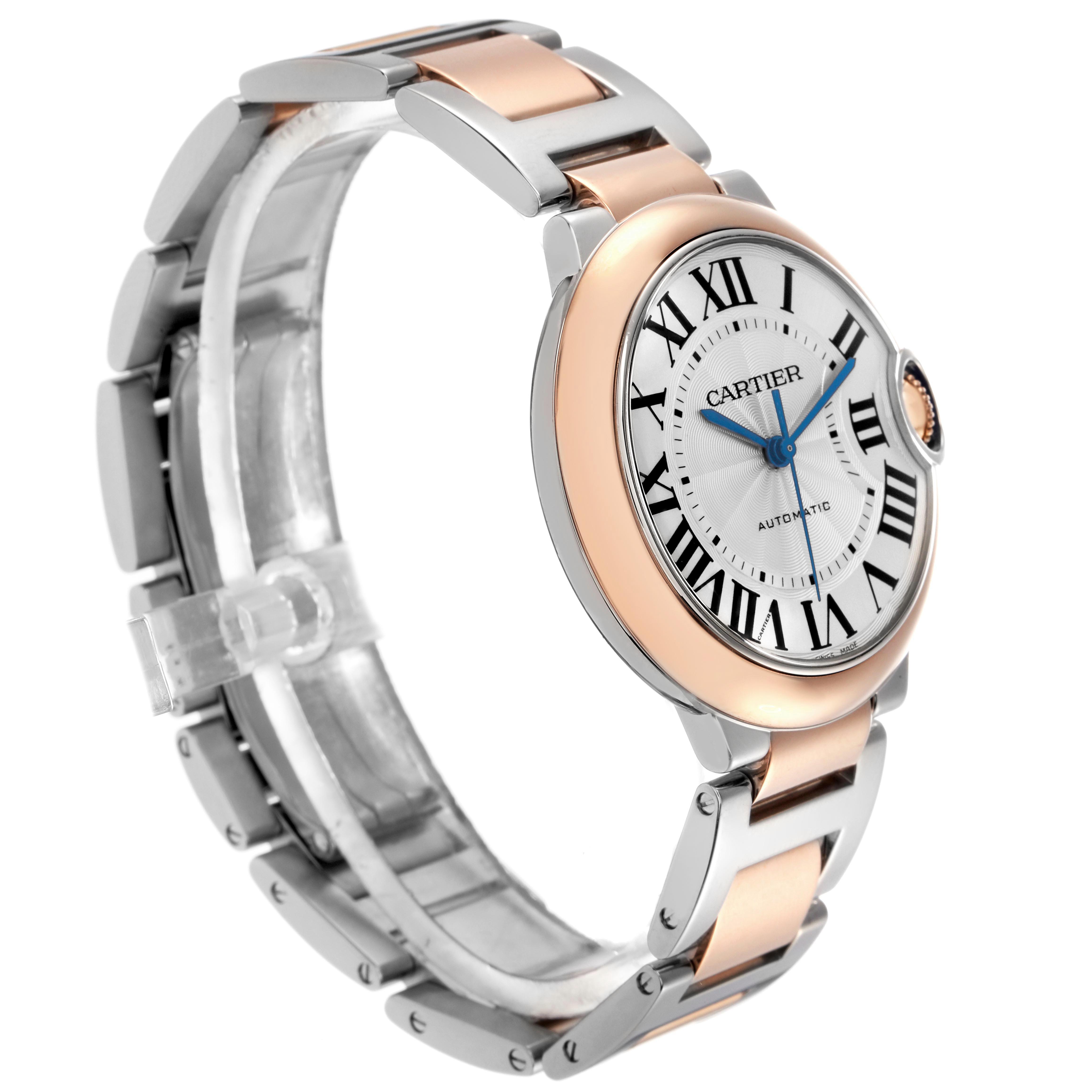 The Cartier Ballon Bleu W2BB0003 Men's Steel and Gold (two tone) Silver Dial watch is shown at a three-quarter angle, highlighting the face, bezel, and band.