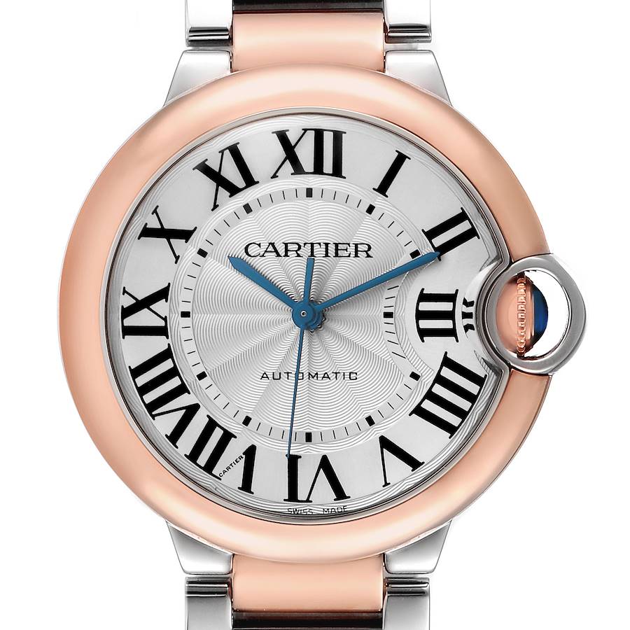The Cartier Ballon Bleu watch is shown from a front angle, highlighting its round face, Roman numerals, and crown detail.