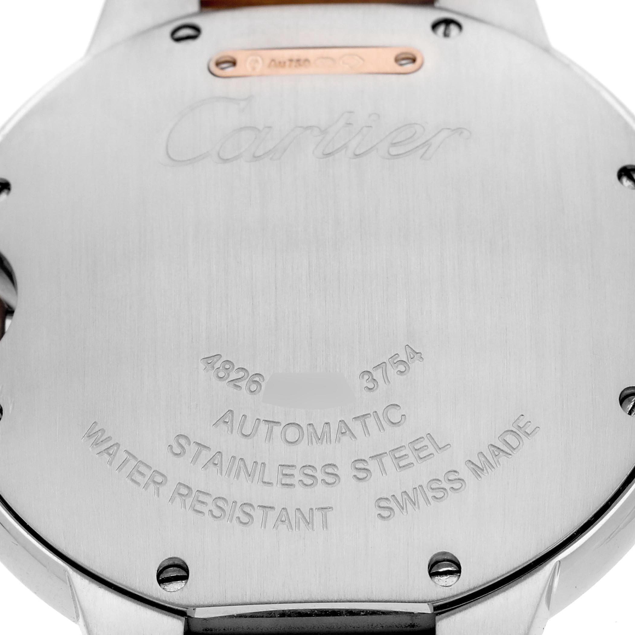 The image shows the back of a Ballon Bleu de Cartier watch, highlighting engravings and metal details.