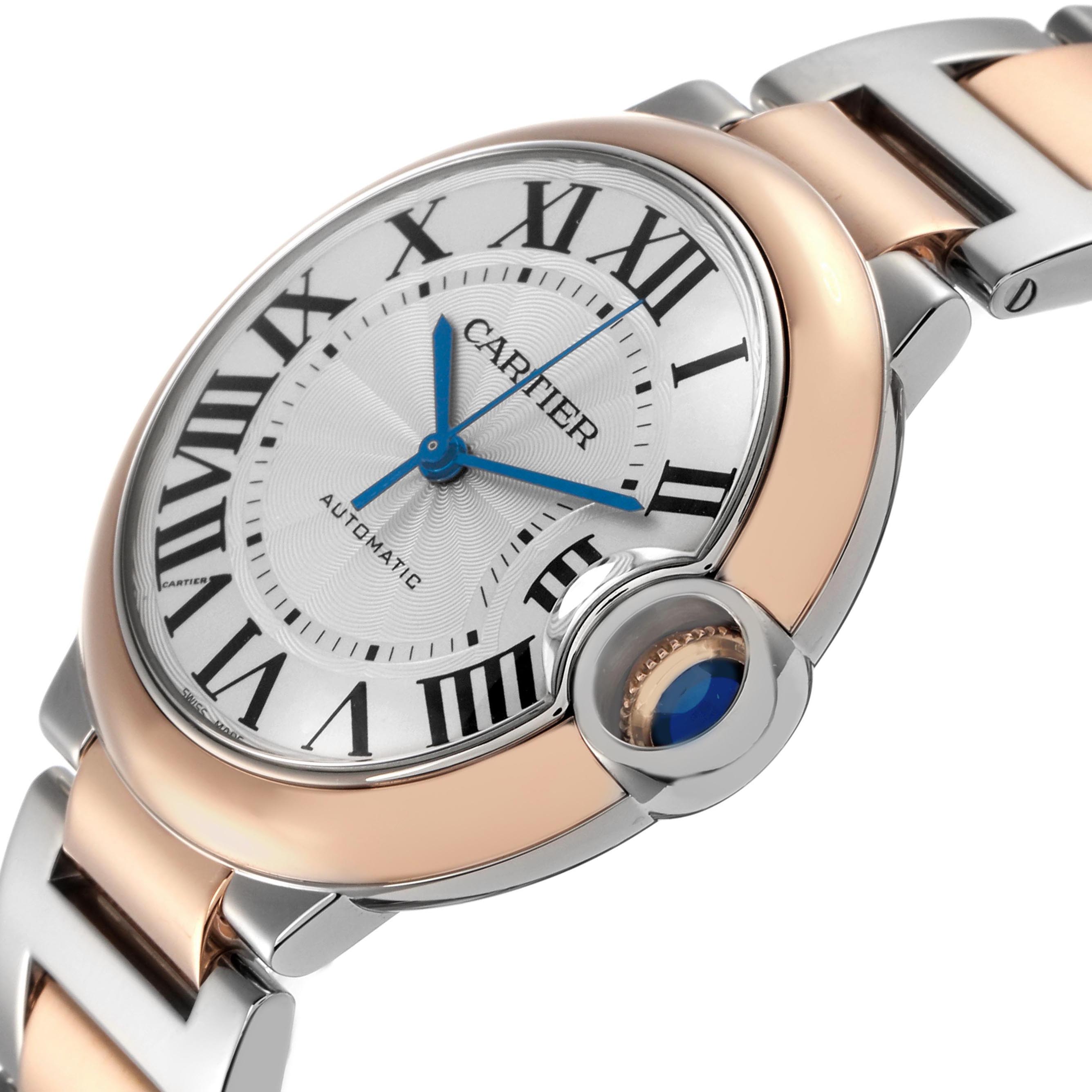 The Cartier Ballon Bleu W2BB0003 Men's Steel and Gold (two tone) Silver Dial watch is shown at a close-up angle, highlighting the dial, crown, and partial bracelet.