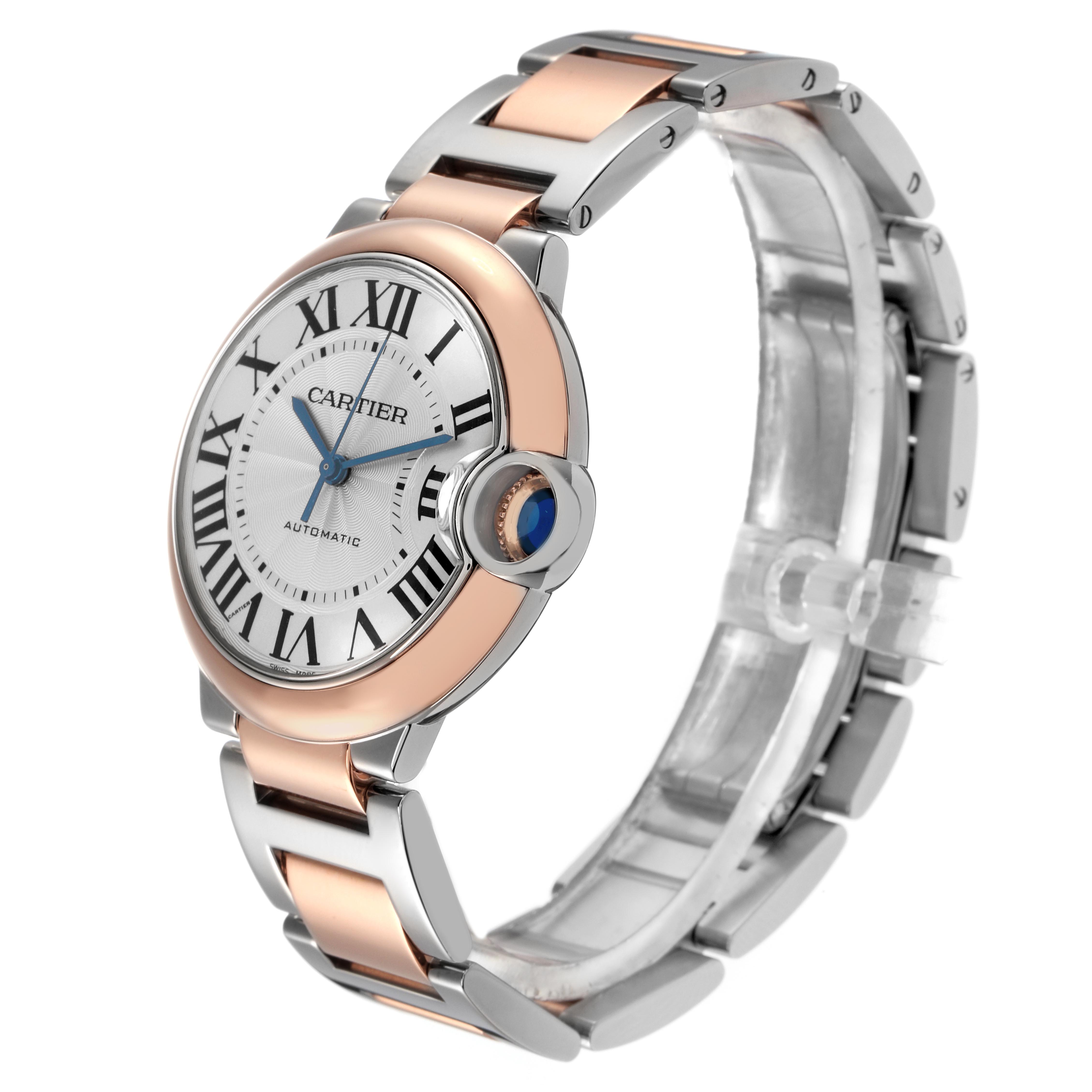 The Cartier Ballon Bleu W2BB0003 Men
s Steel and Gold (two tone) Silver Dial W2BB0003 Men
s Steel and Gold (two tone) Silver Dial watch is shown at a slight angle, revealing the face, crown, and two-tone metal bracelet.