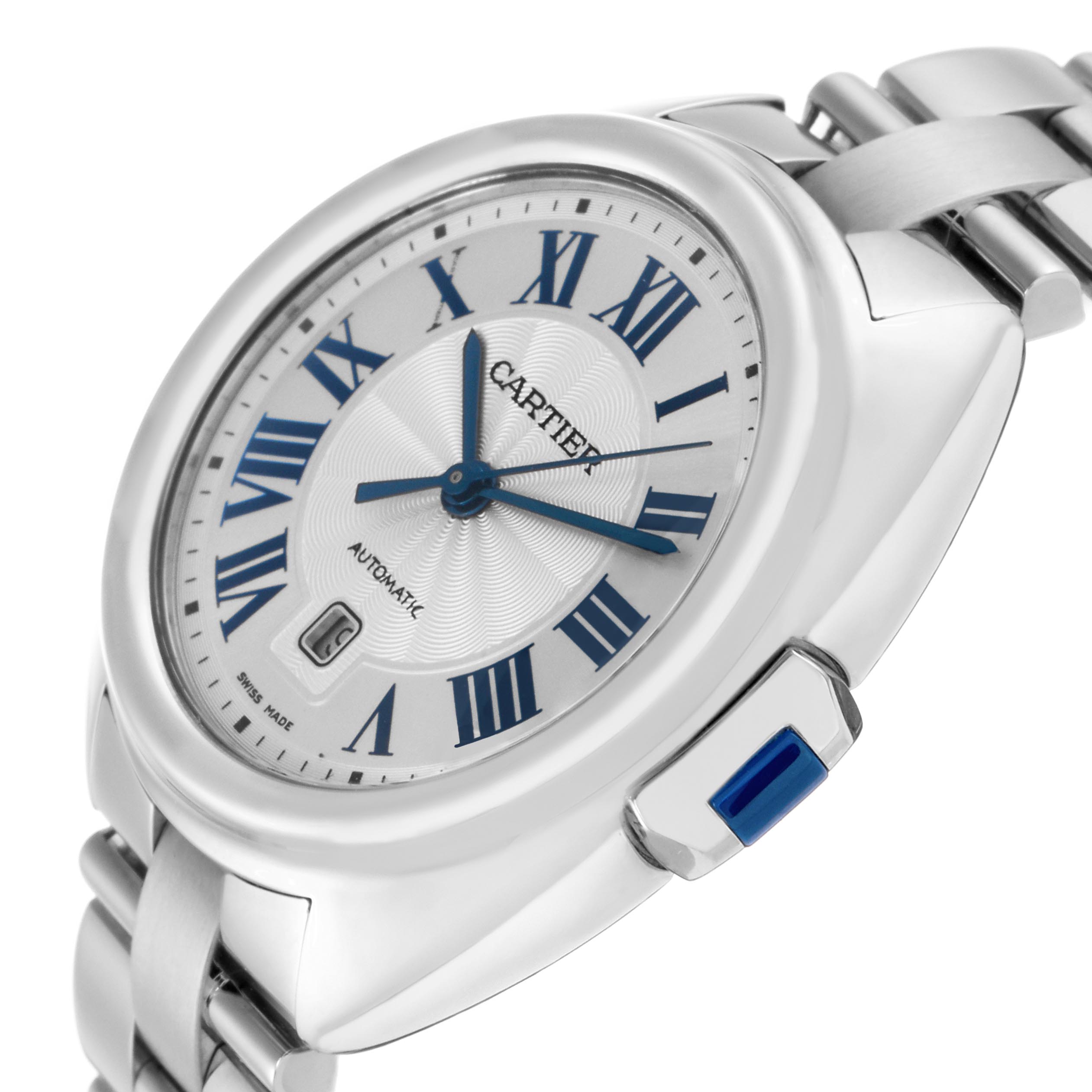 The Cartier Clé watch is shown at an angled side view, highlighting the blue hands, Roman numerals, crown, and metal bracelet.