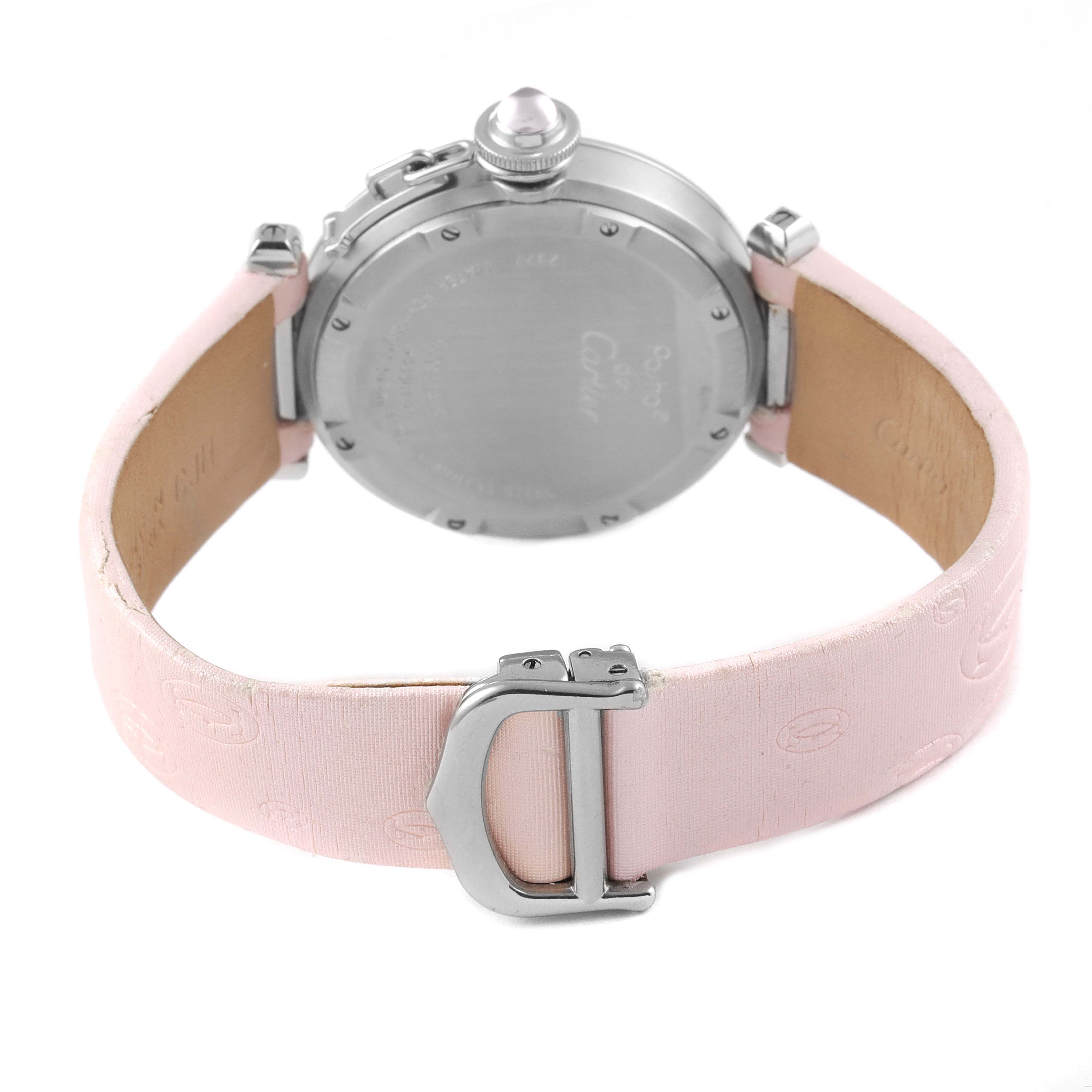 This image shows the back of the Cartier Pasha W3107099 Women's Stainless Steel Mother of Pearl Dial W3107099 Women's Stainless Steel Mother of Pearl Dial watch with a pink strap and visible buckle.