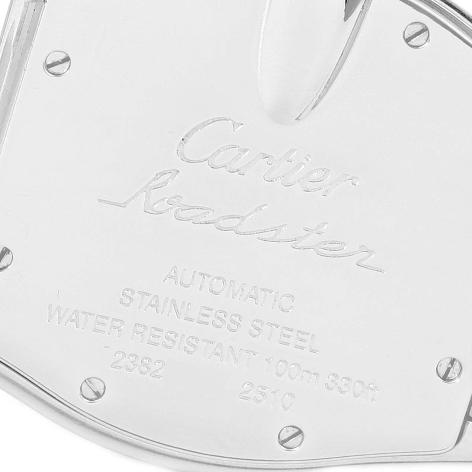 This image shows the back case of a Cartier Roadster W62025V3 Men
s Stainless Steel Silver Dial W62025V3 Men
s Stainless Steel Silver Dial watch, highlighting its engravings and screws.