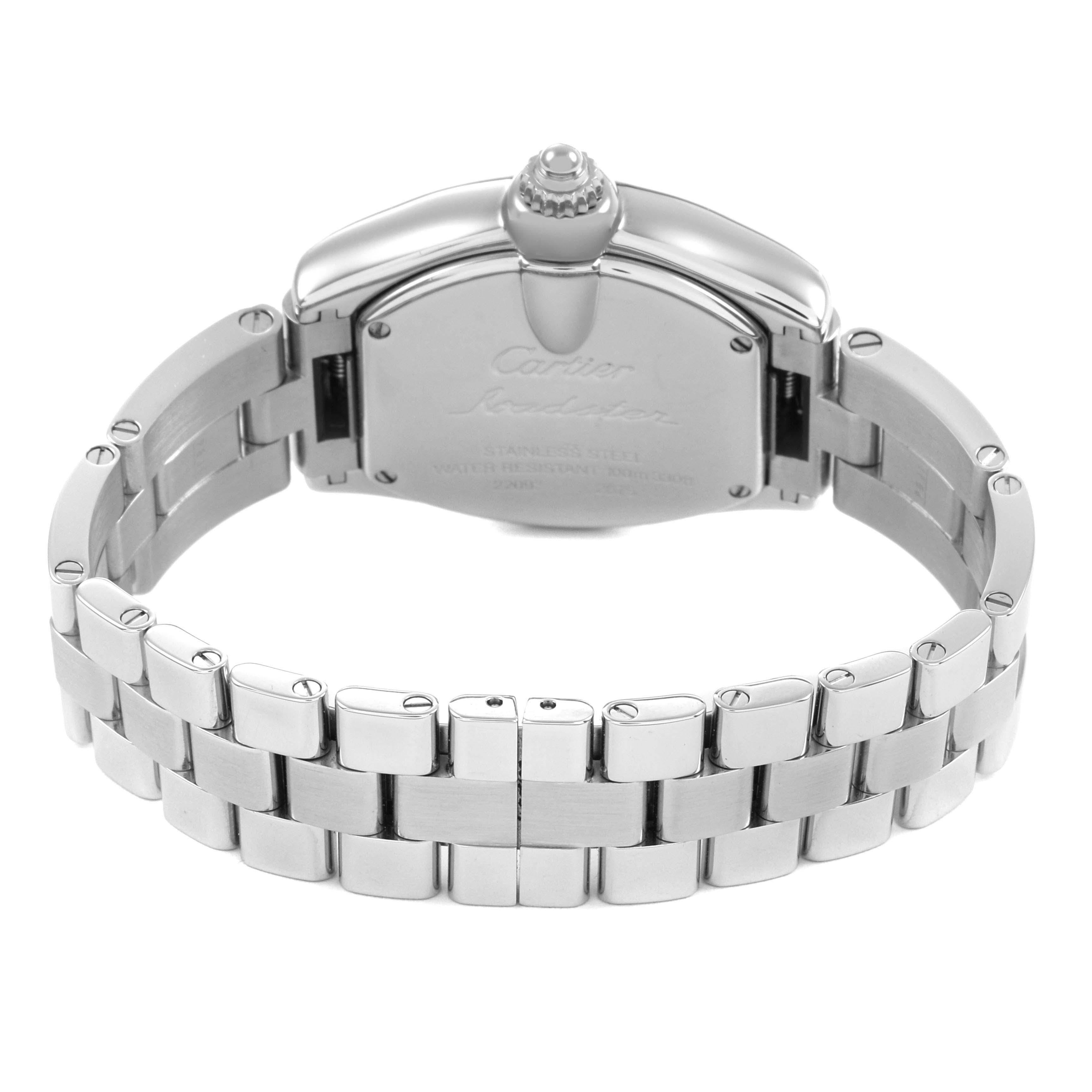 The image shows the back of a Cartier Roadster W62016V3 Women's Stainless Steel Silver Dial watch, highlighting the bracelet and clasp.