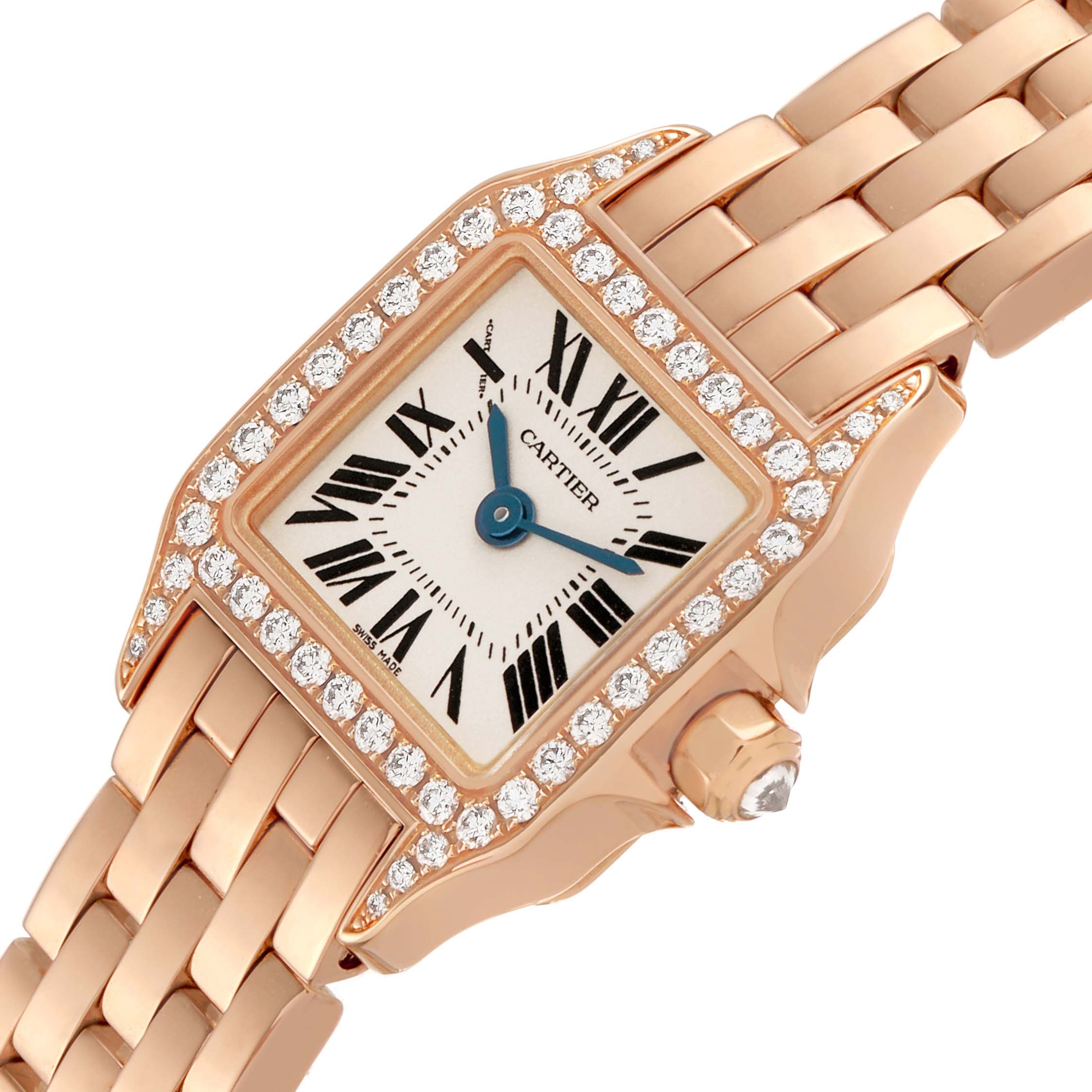 The Cartier Santos Demoiselle WF9011Z8 Women's Rose Gold Silver Dial watch is shown at an angle displaying the face, bejeweled bezel, and a portion of the bracelet.