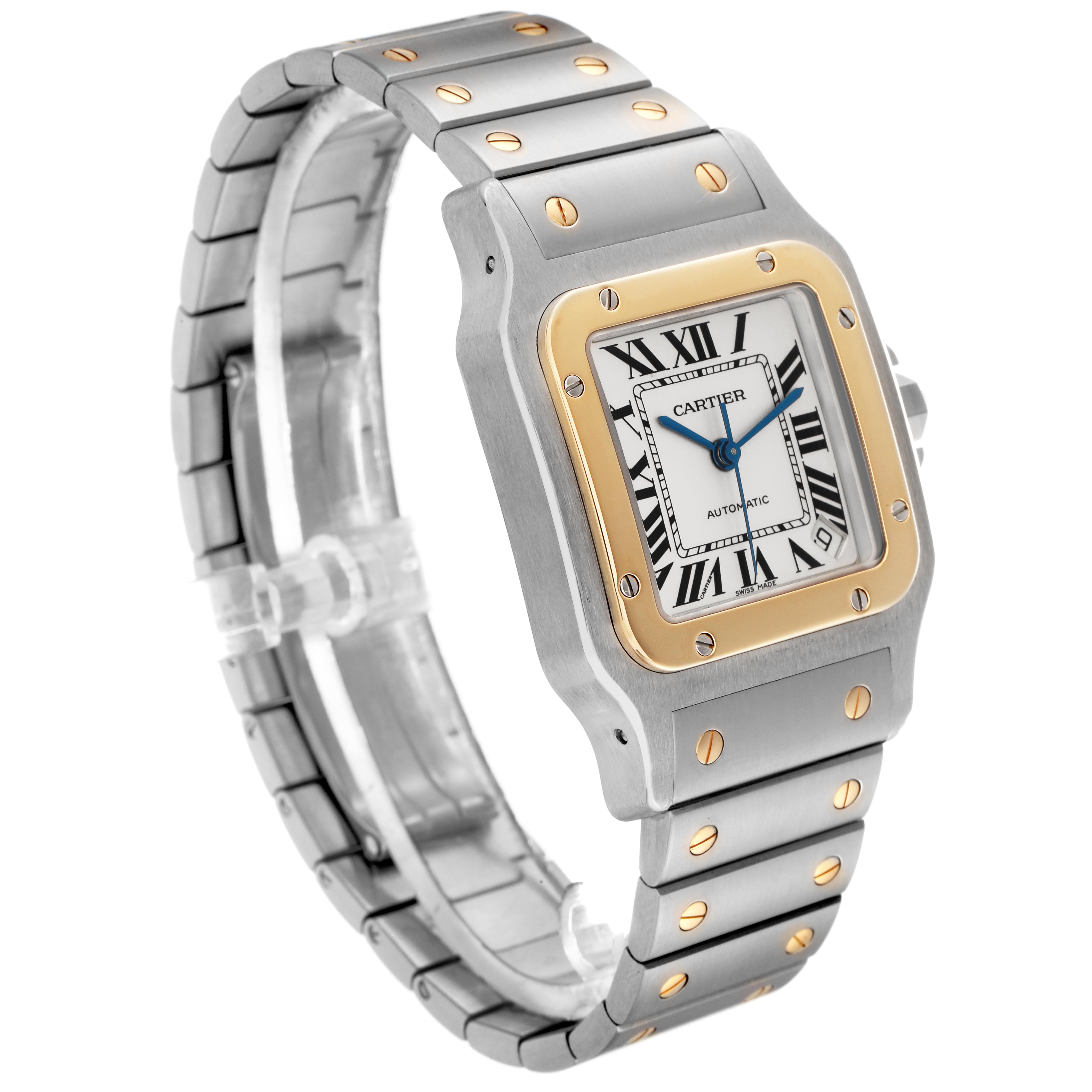 The Cartier Santos W20099C4 Men
s Steel and Gold (two tone) Silver Dial W20099C4 Men
s Steel and Gold (two tone) Silver Dial watch is shown at a three-quarter angle, highlighting the face, bezel, and part of the bracelet.