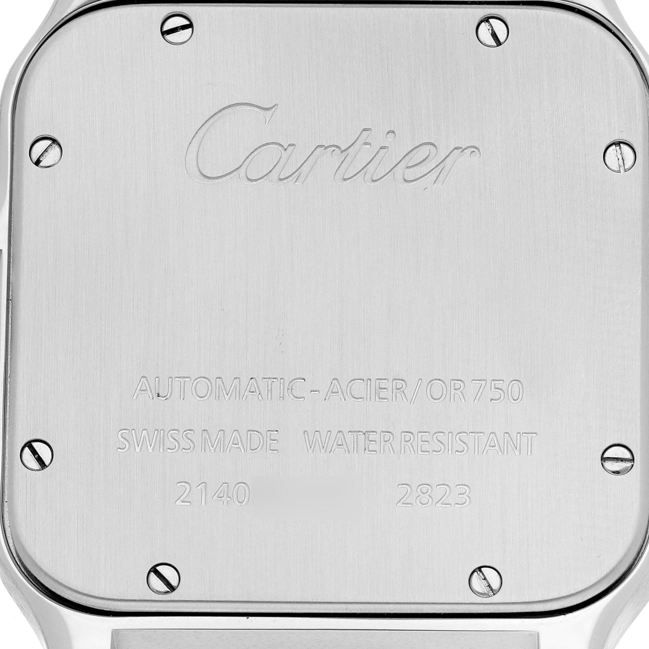 The image shows the back of a Cartier Santos W20099C4 Men
s Steel and Gold (two tone) Silver Dial W20099C4 Men
s Steel and Gold (two tone) Silver Dial watch, highlighting the engraved text and screw details.