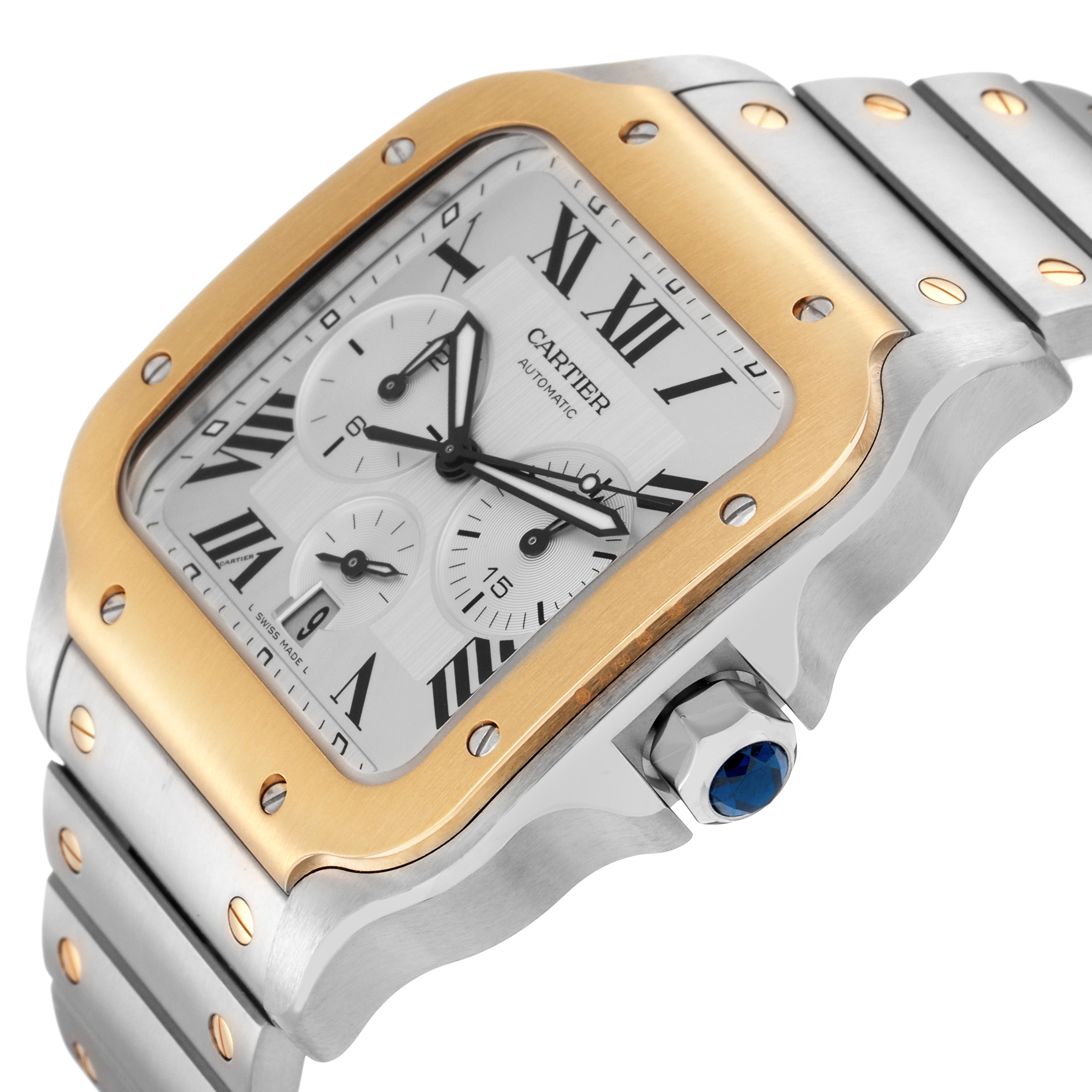 The Cartier Santos W2SA0008 Men
s Steel and Gold (two tone) Silver Dial W2SA0008 Men
s Steel and Gold (two tone) Silver Dial watch is shown from a three-quarter angle, highlighting its square face, gold bezel, and silver bracelet with screw details.