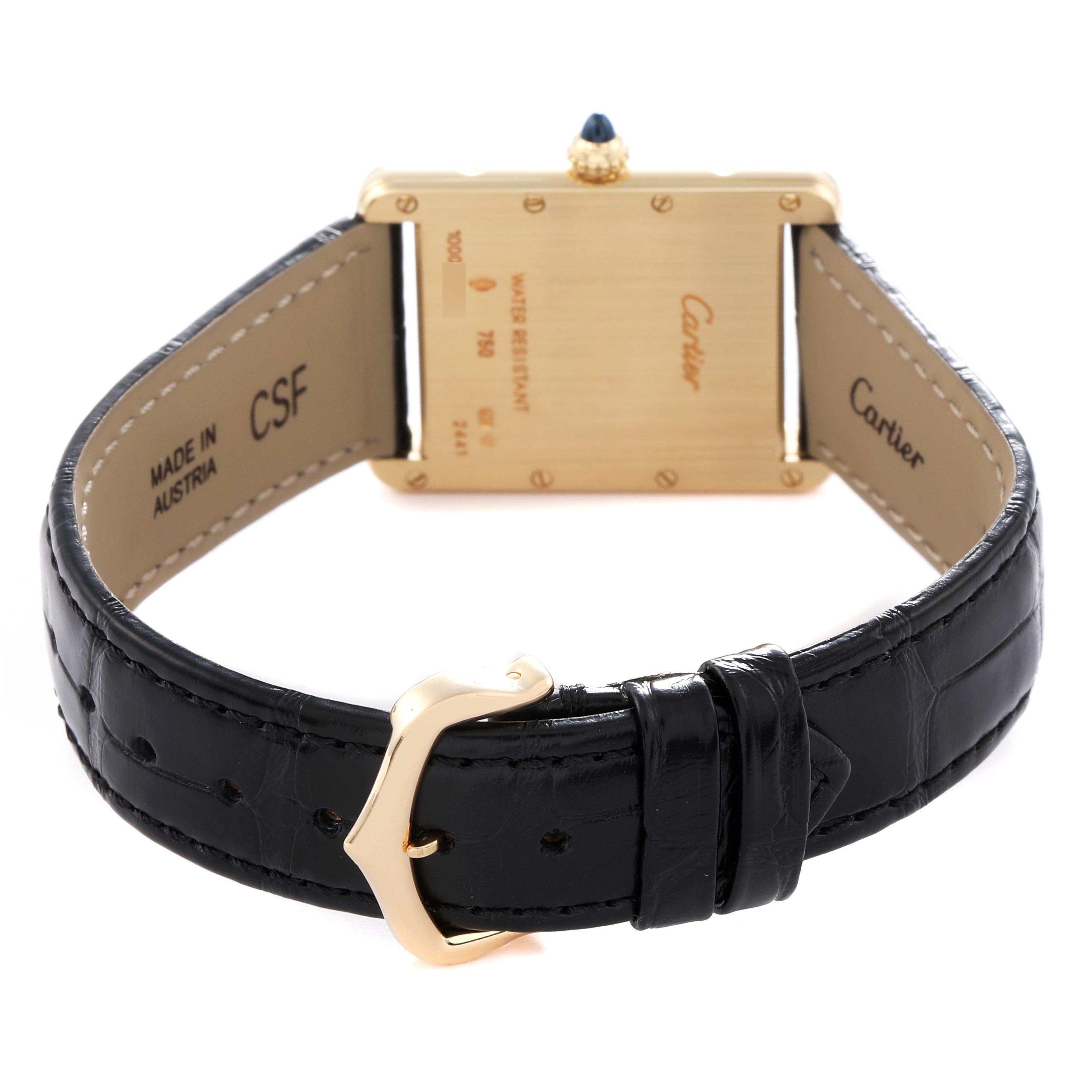 The image shows the back of the Cartier Tank Louis W1529756 Men
s Yellow Gold Silver Dial W1529756 Men
s Yellow Gold Silver Dial watch, including the clasp and leather strap.