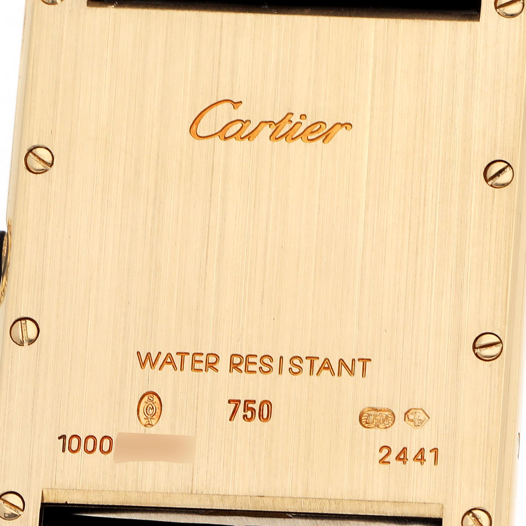 The image shows the back of a Cartier Tank Louis W1529756 Men
s Yellow Gold Silver Dial W1529756 Men
s Yellow Gold Silver Dial watch, highlighting engravings and screws.