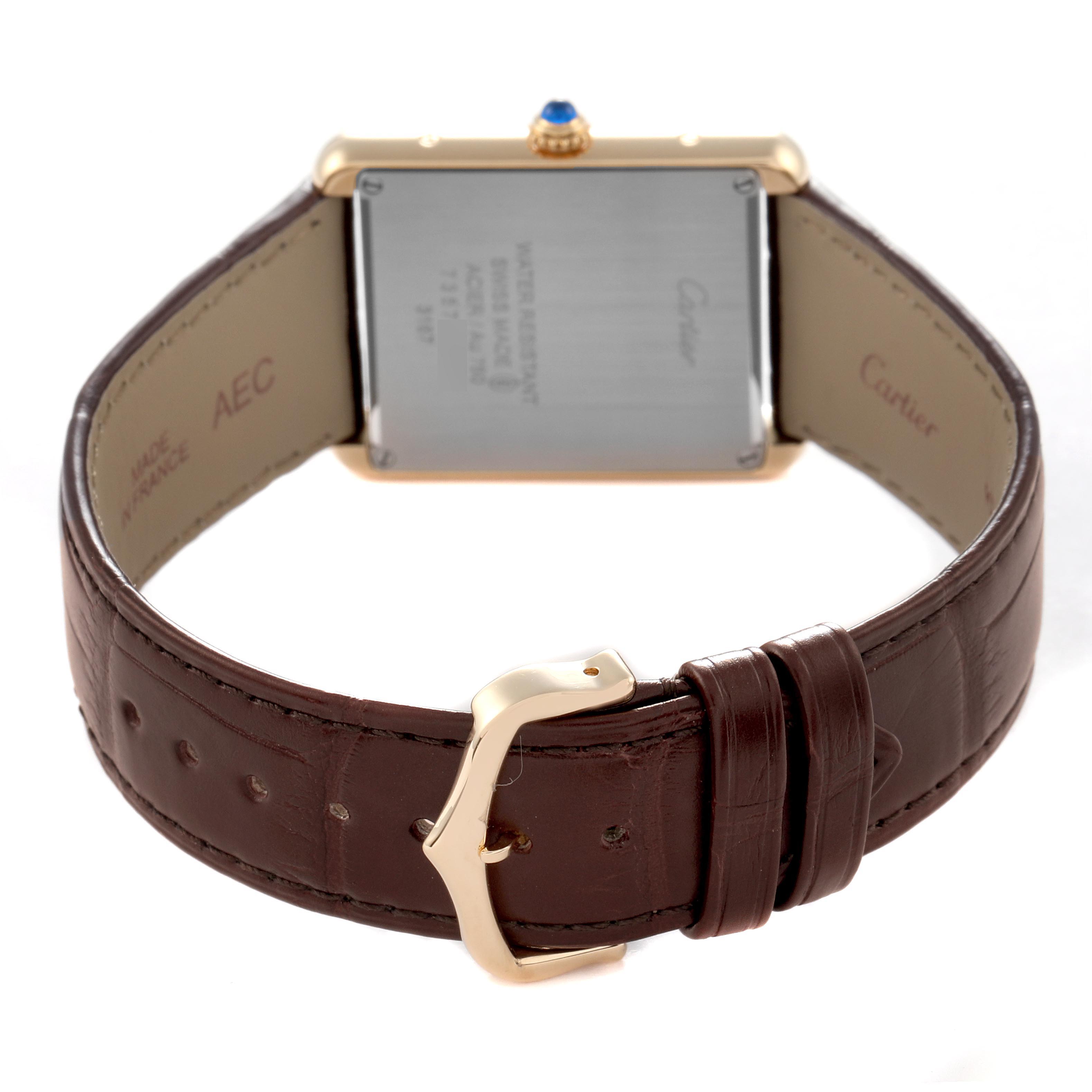 This image shows the back view of the Cartier Tank Solo W5200004 Men
s Steel and Gold (two tone) Silver Dial W5200004 Men
s Steel and Gold (two tone) Silver Dial, highlighting the case back, crown, and leather strap with buckle.