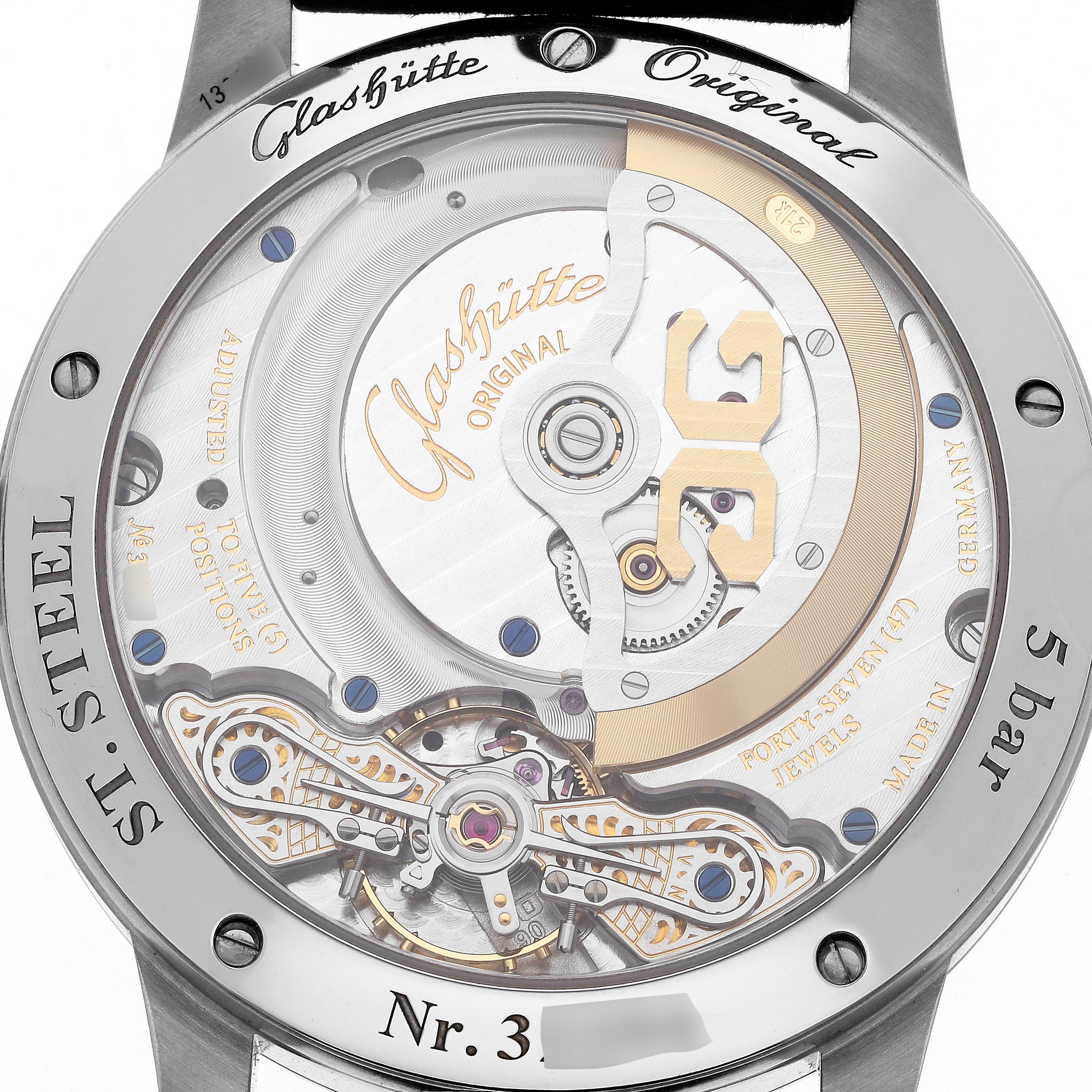 The image shows the back view of a Glashütte Pano watch, highlighting the intricate mechanical movement and engraved details.
