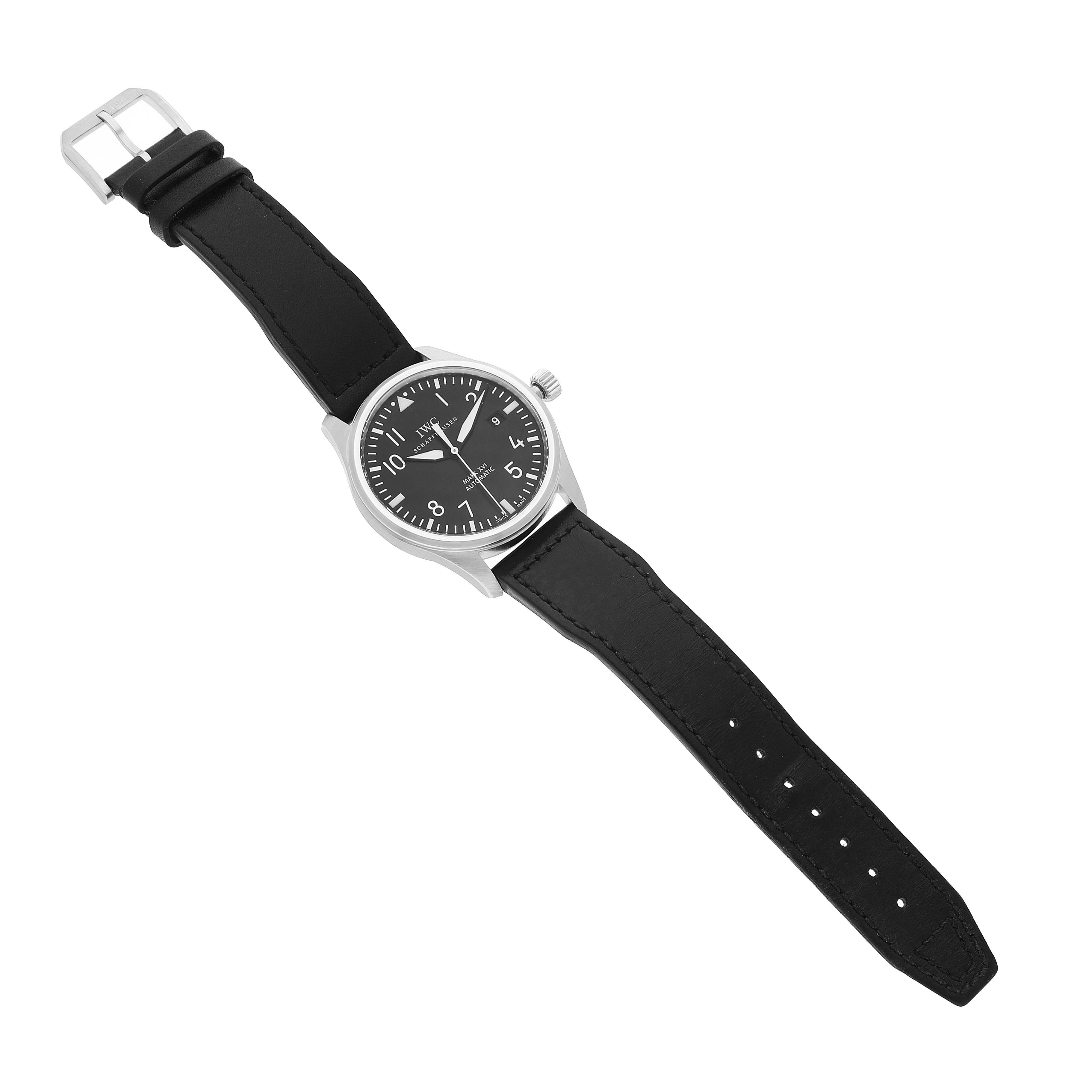 The IWC Pilot IW325501 Men's Stainless Steel Black Dial model watch is shown from a top-down angle, highlighting its face, crown, and black strap.