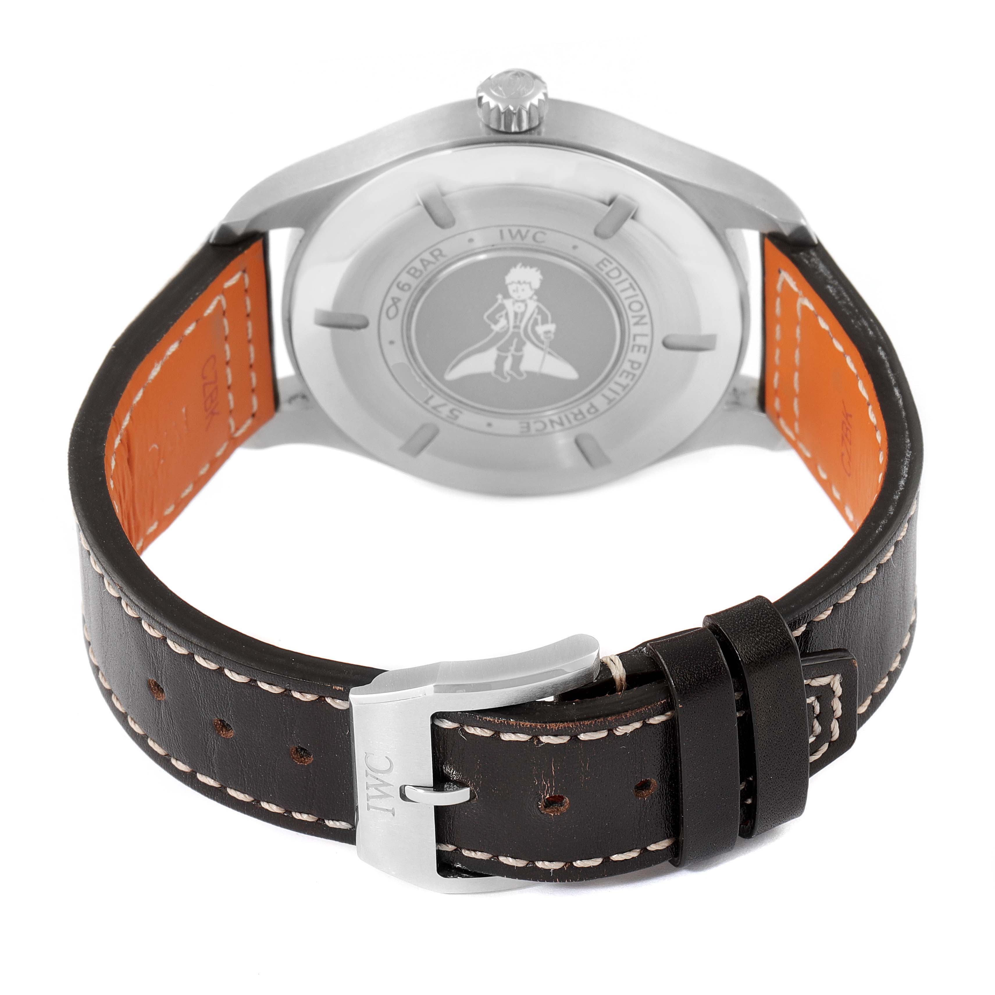 The image shows the back view of an IWC Pilot IW327010 Men's Stainless Steel Blue Dial IW327010 Men's Stainless Steel Blue Dial model watch, highlighting the case back and leather strap with stitching.