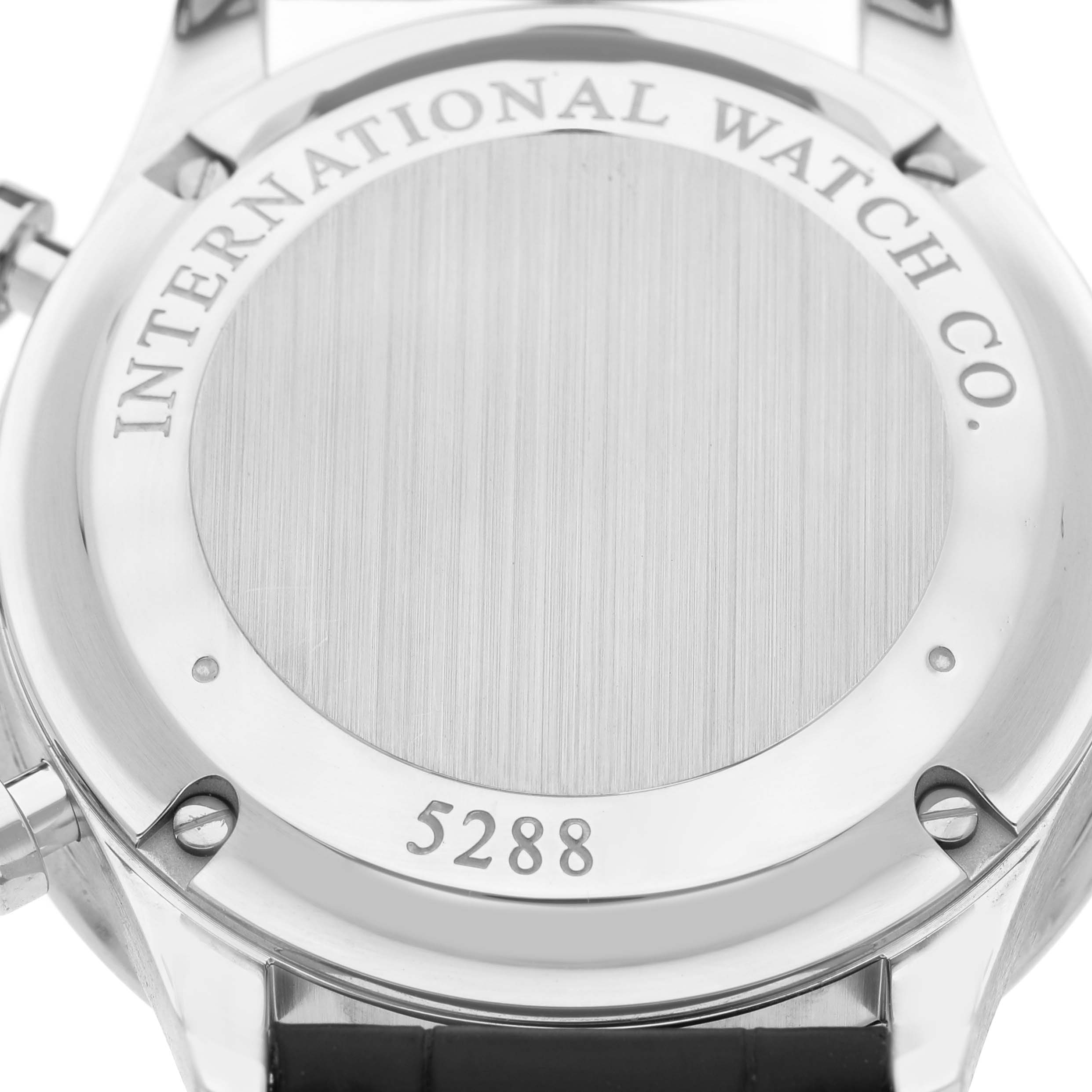 The image shows the back of the IWC Portofino IW371604 Men's Stainless Steel Silver Dial watch, with visible engraving and a serial number.