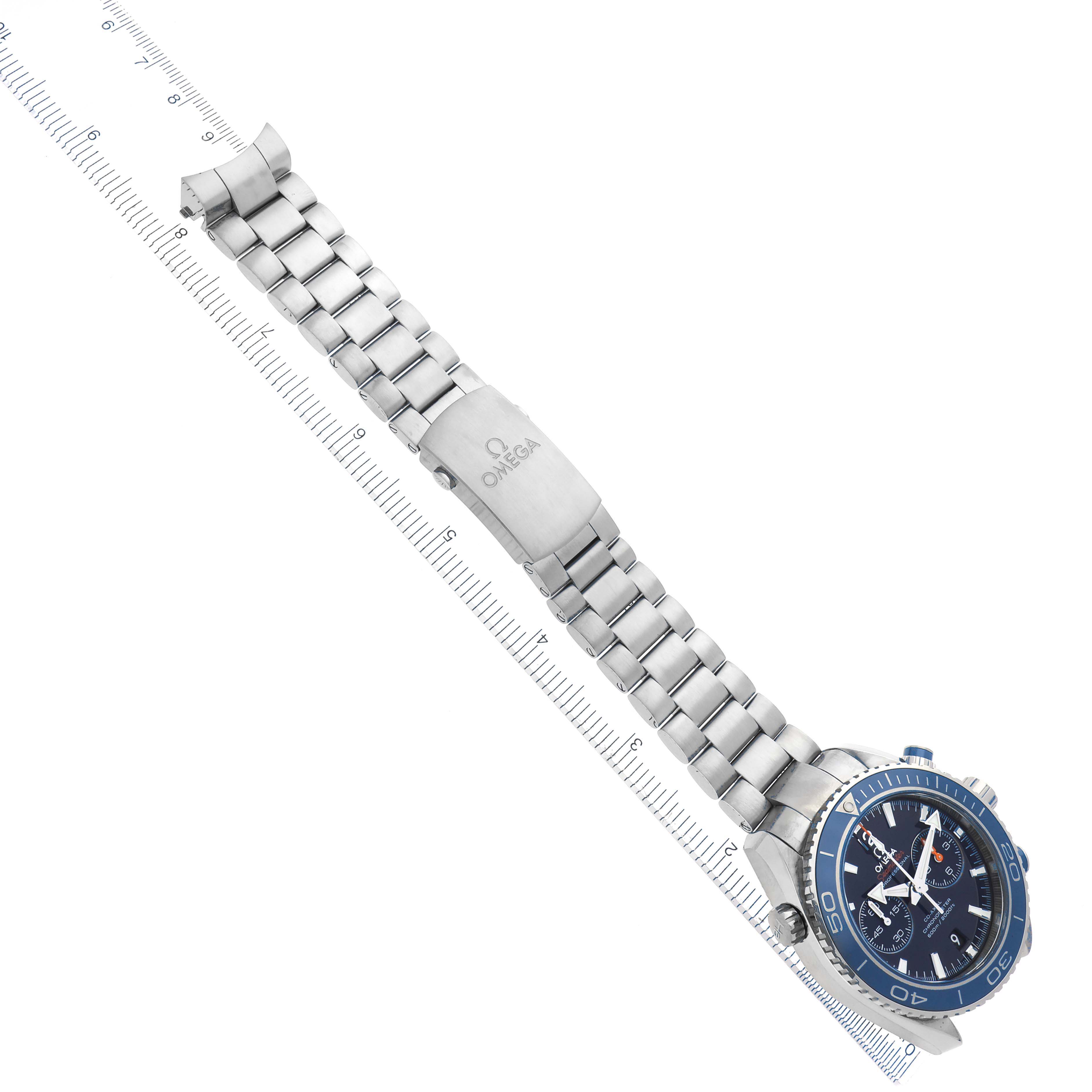 The Omega Planet Ocean 232.90.46.51.03.001 Men
s Stainless Steel Blue Dial 232.90.46.51.03.001 Men
s Stainless Steel Blue Dial watch is shown at an angle, highlighting the blue bezel, face, and stainless steel bracelet with clasp.