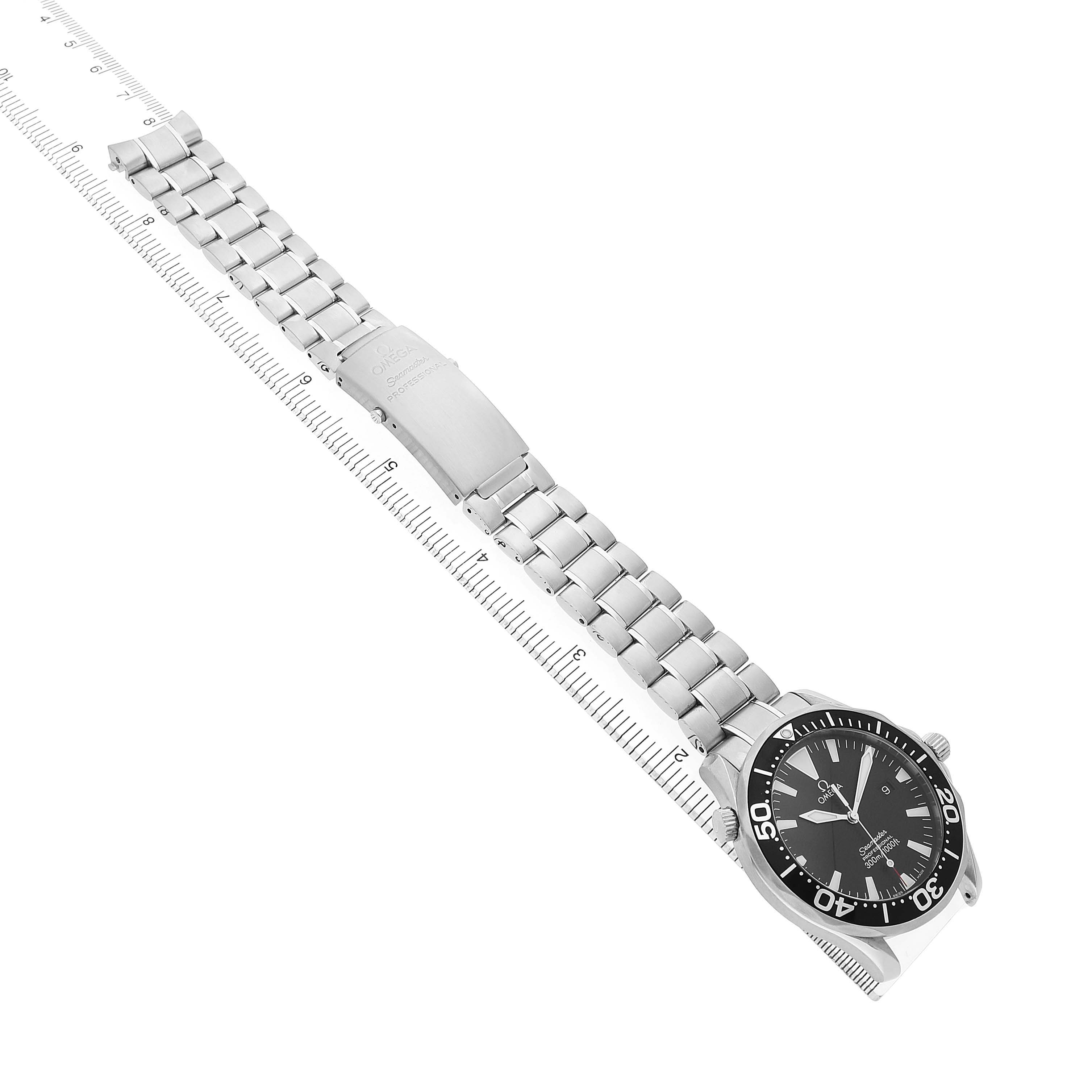 The Omega Seamaster 2264.50.00 Mens Stainless Steel Black Dial watch is shown at an angled top view, featuring the face, bezel, and full metal bracelet.