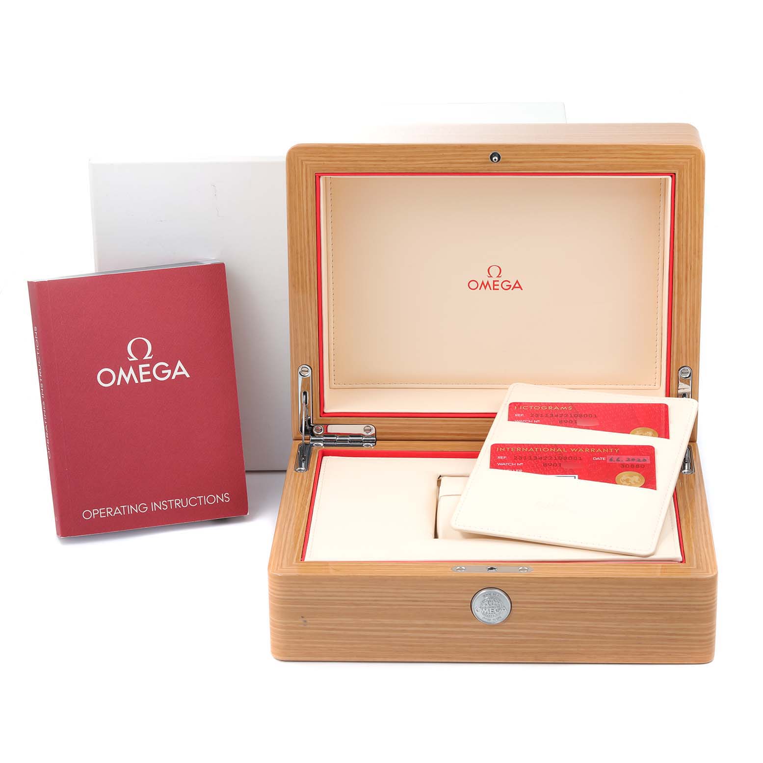 The image shows the opened packaging for the Omega Aqua Terra 231.13.42.21.03.001 Men
s Stainless Steel Blue Dial 231.13.42.21.03.001 Men
s Stainless Steel Blue Dial watch, including the operating instructions and warranty cards.