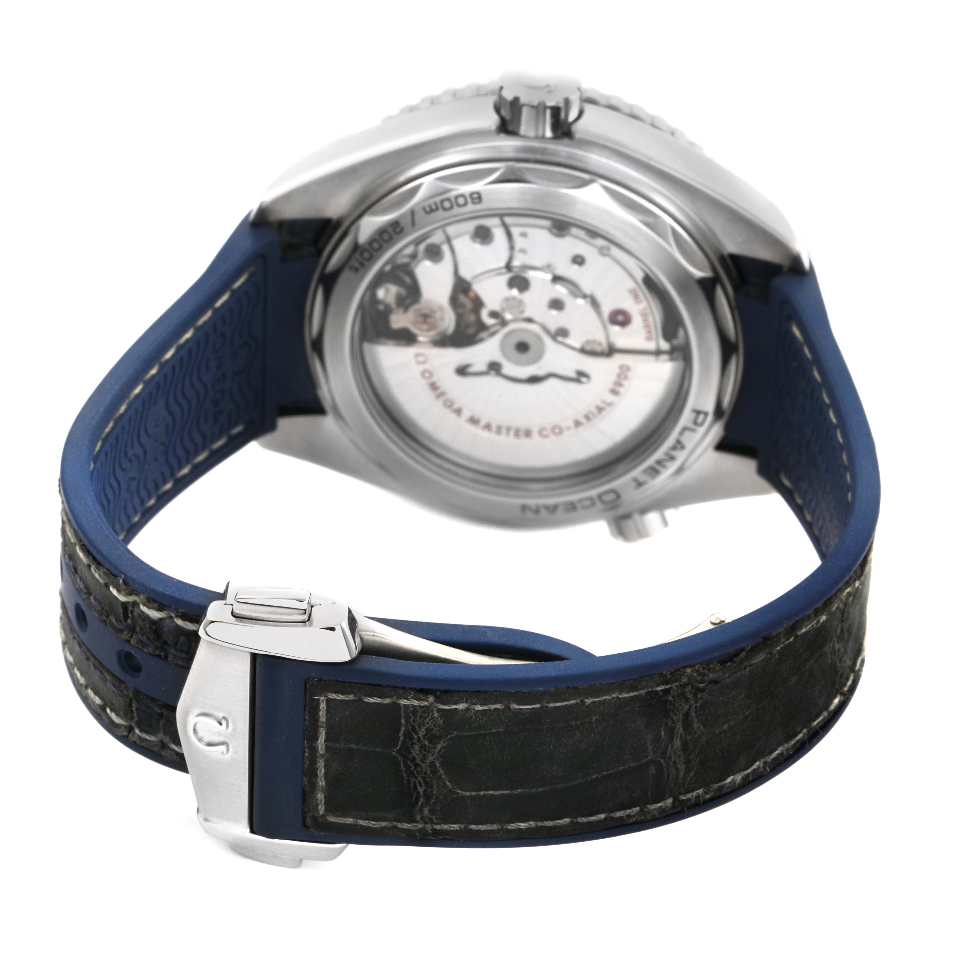 The Omega Seamaster 215.33.44.21.03.001 Mens Stainless Steel Blue Dial watch is shown from the rear angle, highlighting the exhibition case back and clasp.