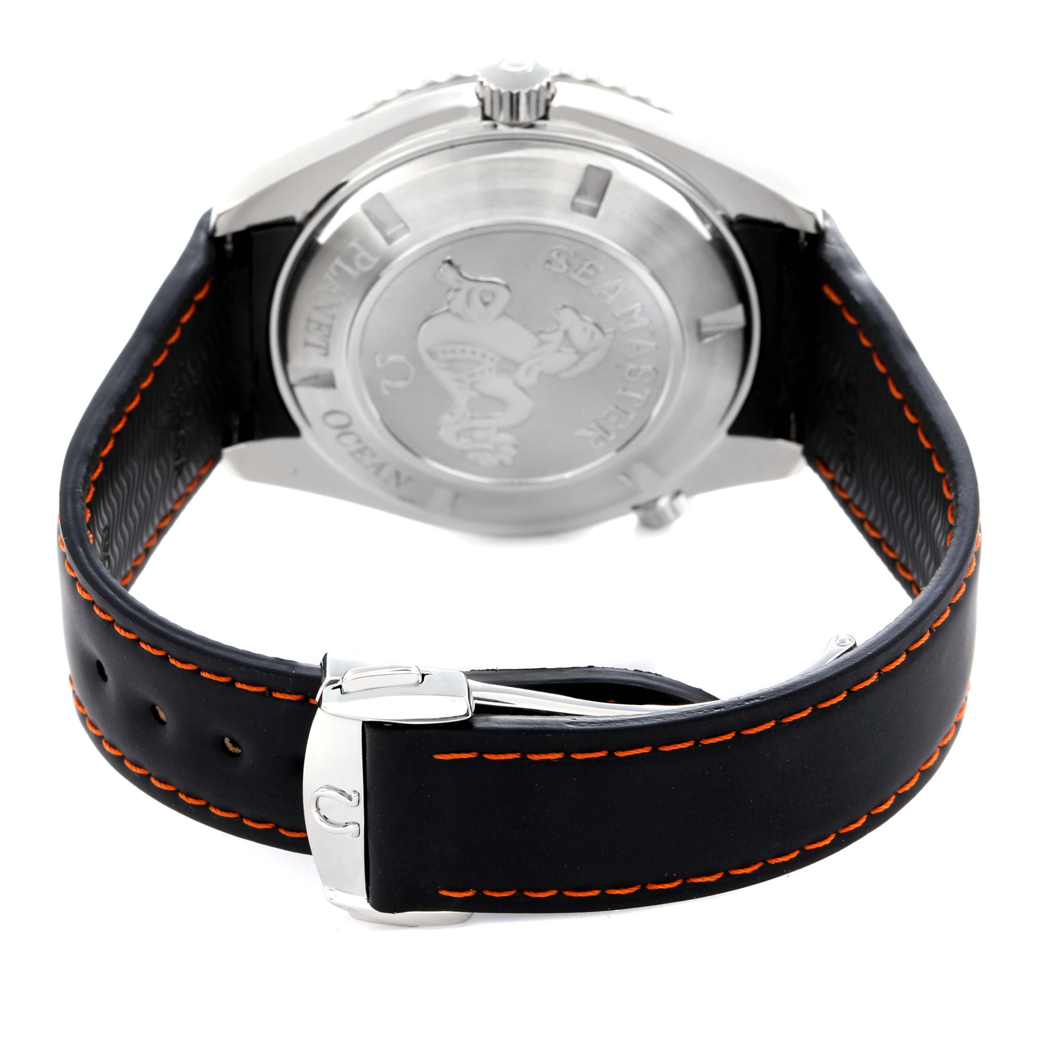 The Omega Planet Ocean 2908.50.38 Men
s Stainless Steel Black Dial 2908.50.38 Men
s Stainless Steel Black Dial watch is shown from the rear, highlighting the case back and black strap with orange stitching.