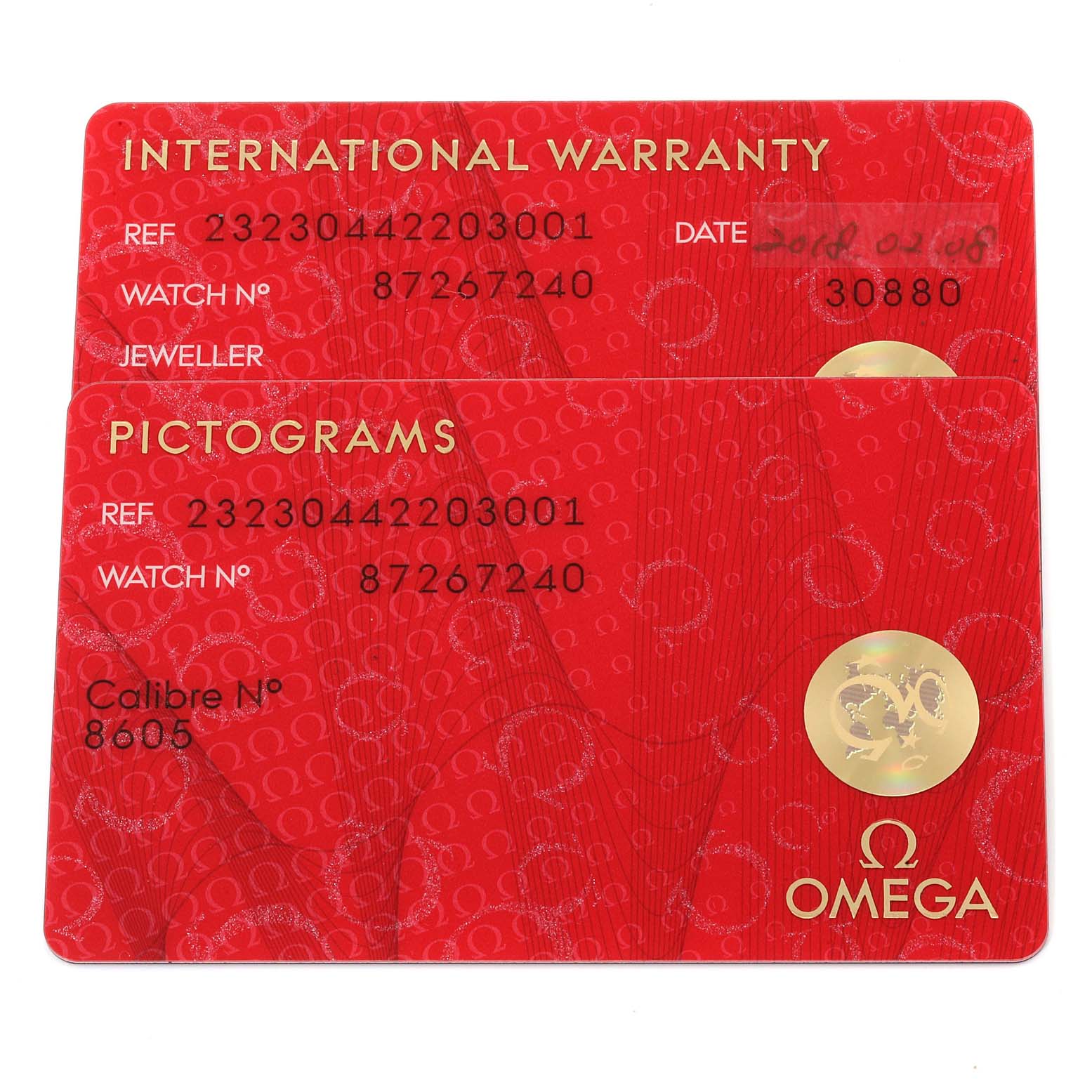 The image shows two red cards for the Omega Planet Ocean 232.30.44.22.03.001 Men
s Stainless Steel Blue Dial 232.30.44.22.03.001 Men
s Stainless Steel Blue Dial model: an International Warranty card and a Pictogram card.