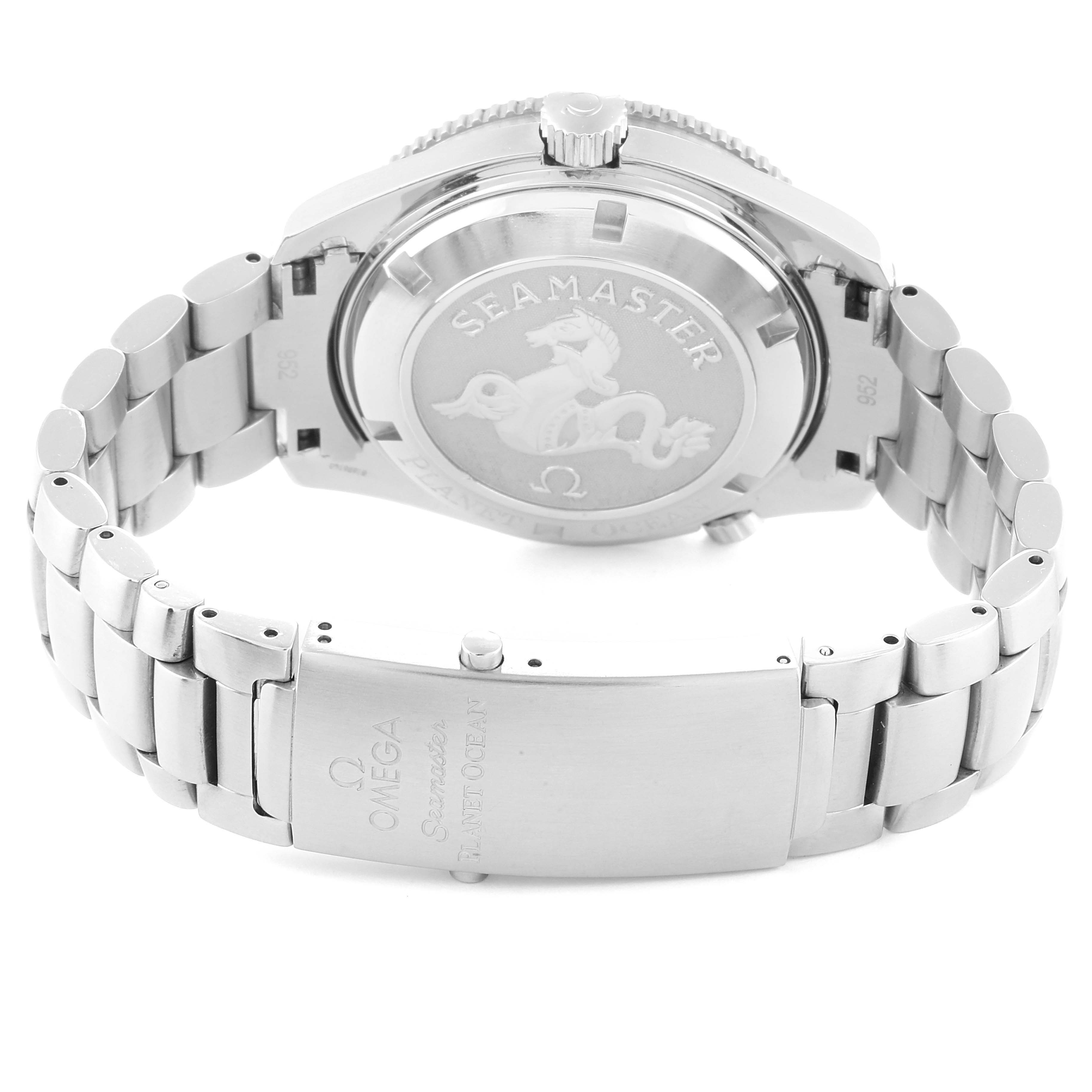 The image shows the back case and bracelet of an Omega Seamaster 2209.50.00 Men
s Stainless Steel Black Dial 2209.50.00 Men
s Stainless Steel Black Dial watch, displaying the branded clasp and engraved case back.