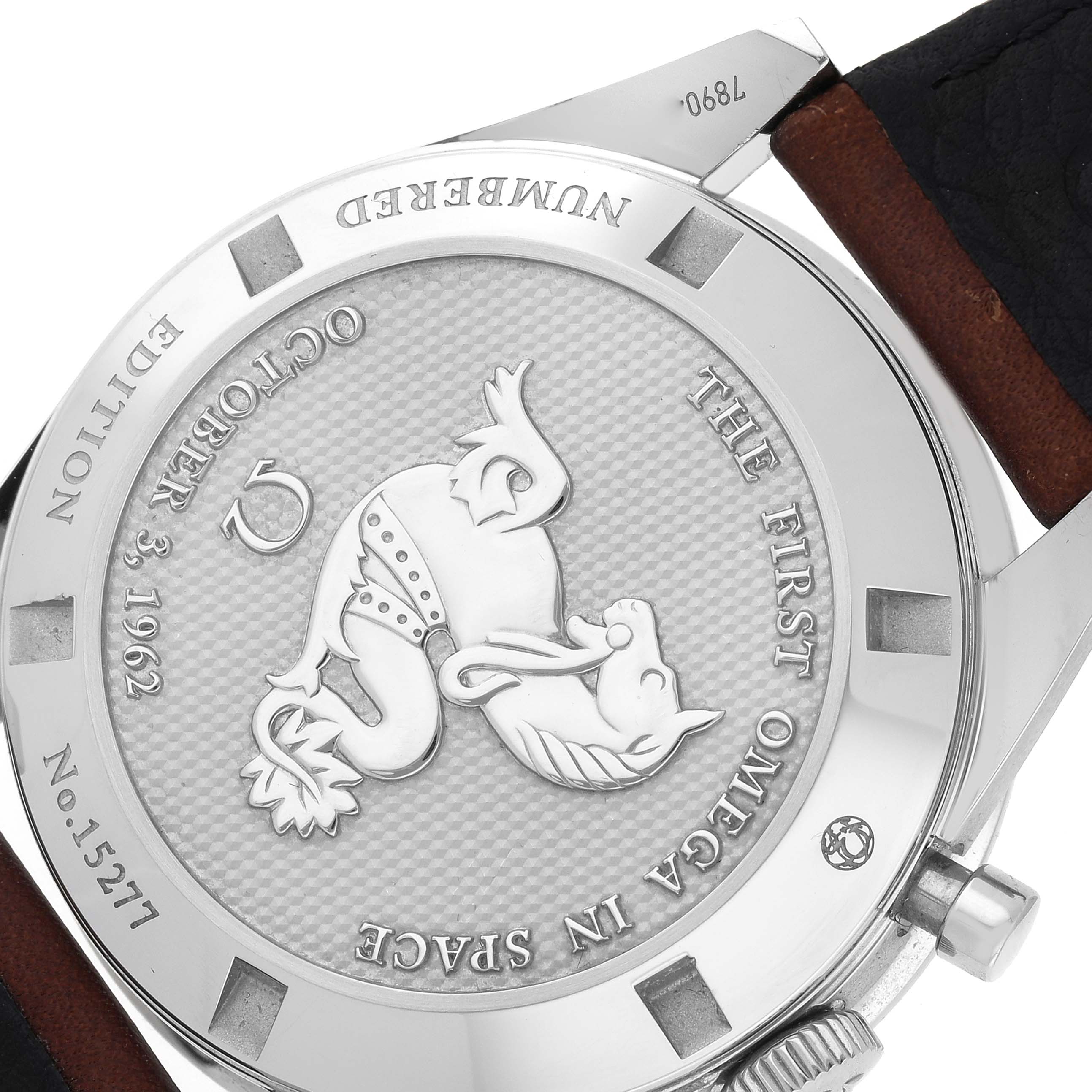 The image shows the case back of the Omega Speedmaster 311.32.40.30.01.001 Men
s Stainless Steel Black Dial 311.32.40.30.01.001 Men
s Stainless Steel Black Dial watch, featuring an engraved emblem and text.