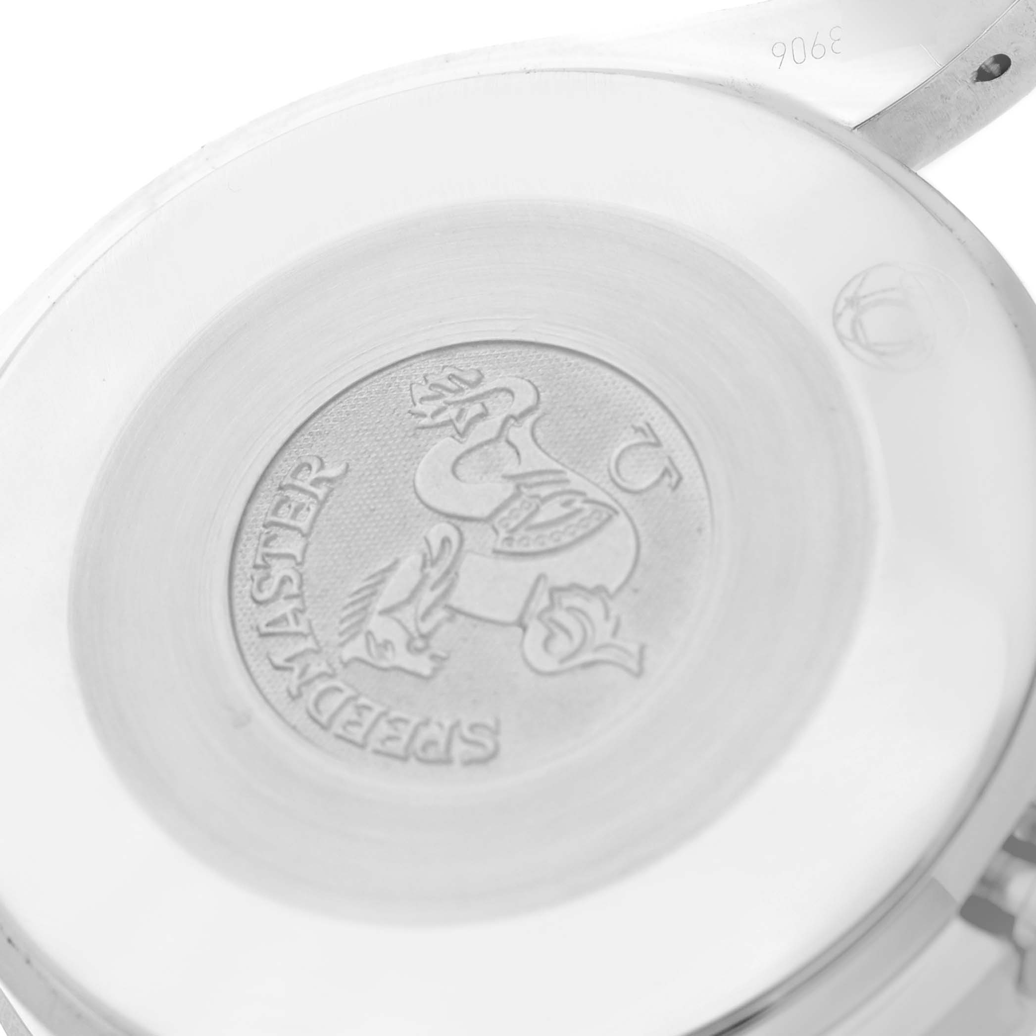 The image shows the back case of the Omega Speedmaster 3834.71.33 Men's Stainless Steel Mother of Pearl Dial 3834.71.33 Men's Stainless Steel Mother of Pearl Dial watch featuring an engraved emblem and branding.