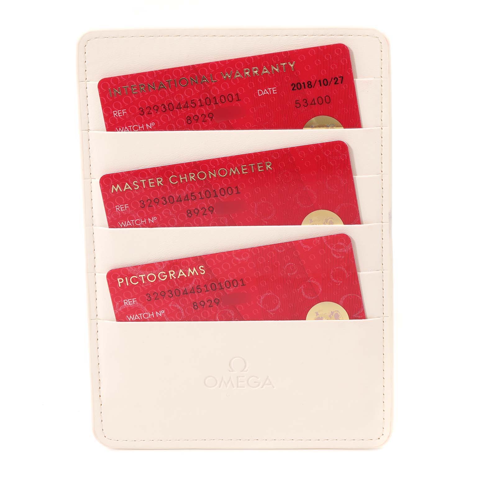 The image shows an Omega Speedmaster 329.30.44.51.01.001 Men
s Stainless Steel Black Dial 329.30.44.51.01.001 Men
s Stainless Steel Black Dial cardholder containing warranty and certification cards viewed from the front.