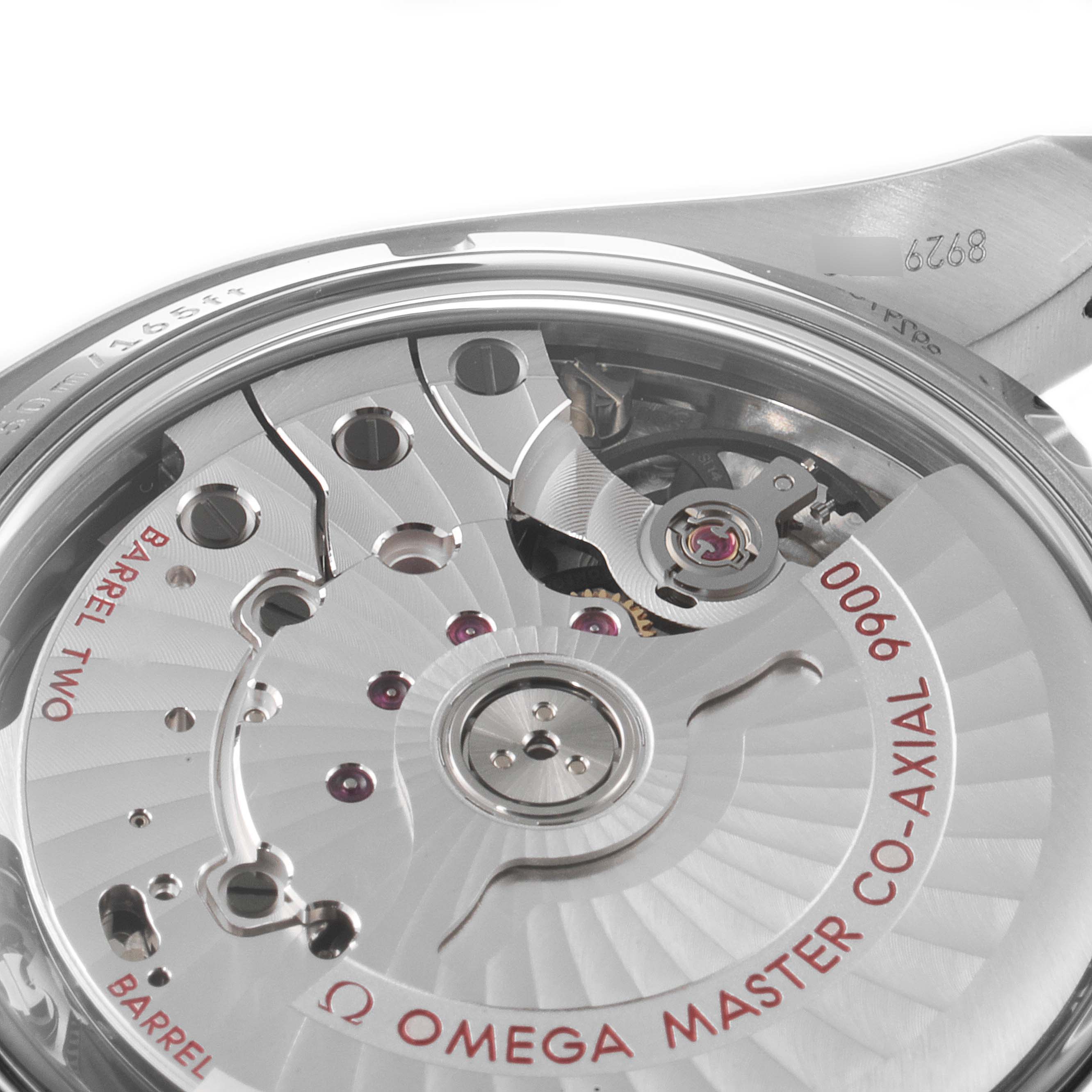 This image shows a close-up view of the Omega Speedmaster 329.30.44.51.01.001 Men
s Stainless Steel Black Dial 329.30.44.51.01.001 Men
s Stainless Steel Black Dial
s Co-Axial 9900 movement through its transparent case back.