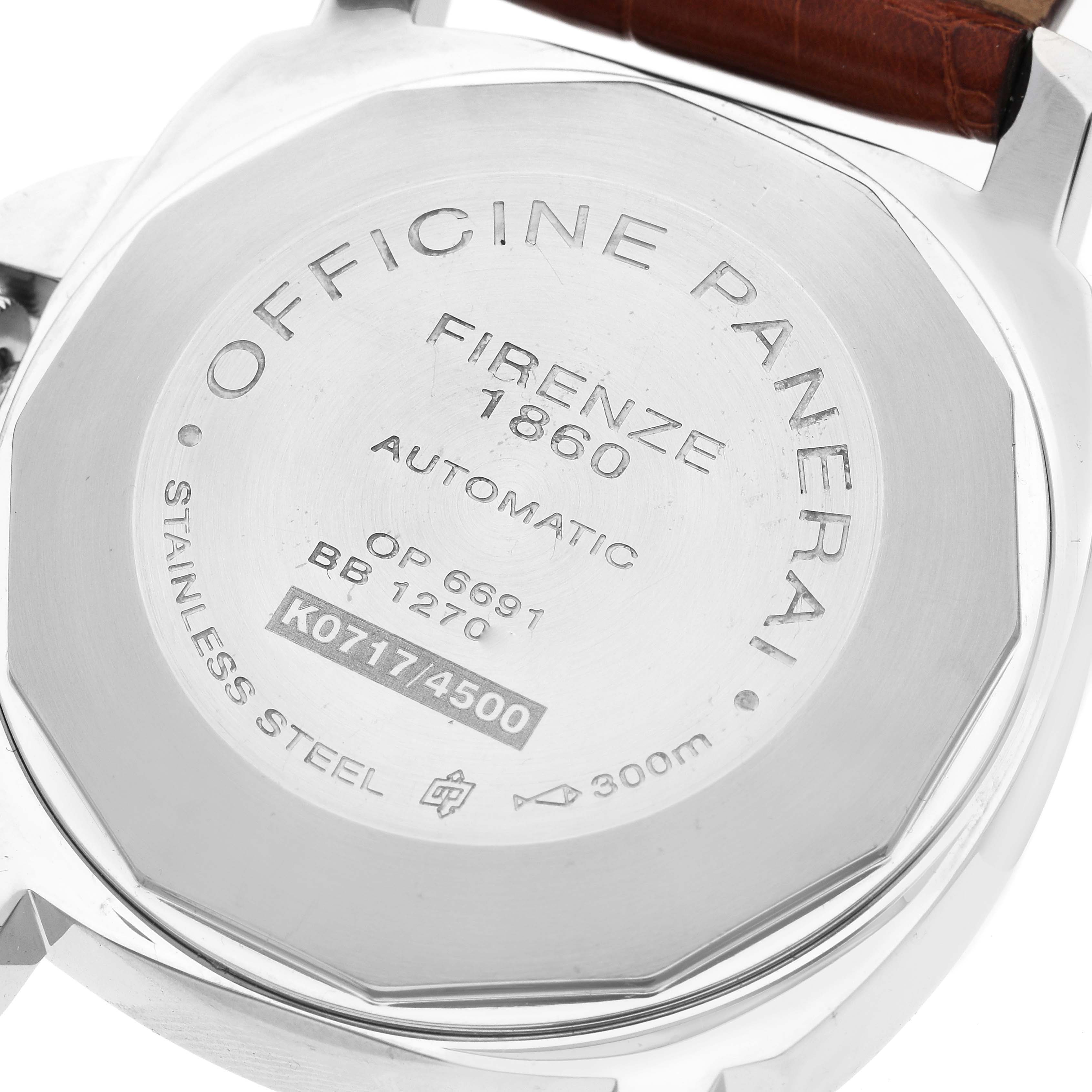 The image shows the case back of the Panerai Luminor PAM00088 Men
s Stainless Steel Black Dial PAM00088 Men
s Stainless Steel Black Dial model watch with detailed engravings.