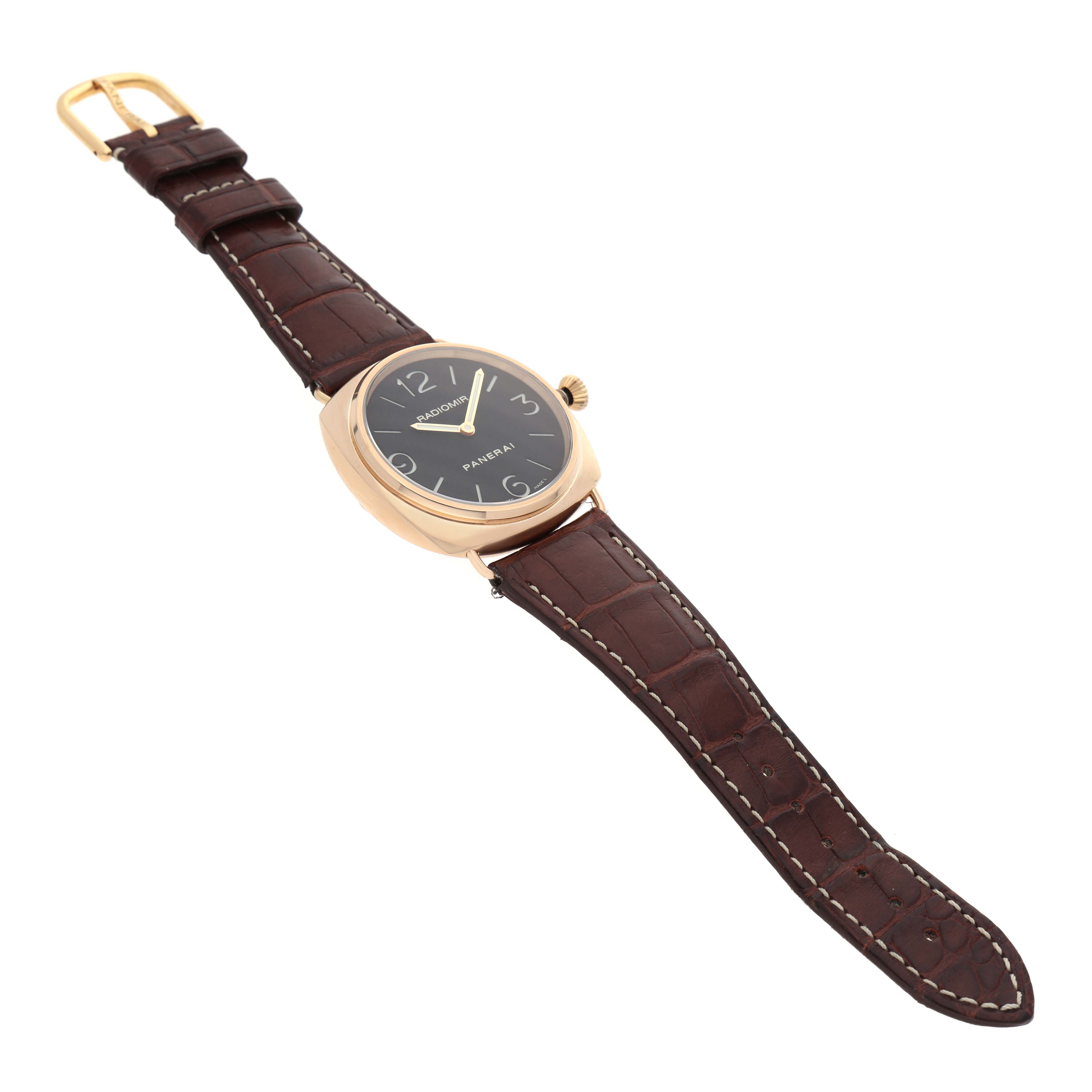 The image shows a Panerai Radiomir PAM00231 Men's Rose Gold Black Dial PAM00231 Men's Rose Gold Black Dial watch at an angled top-down view, highlighting its face, case, crown, and leather strap.