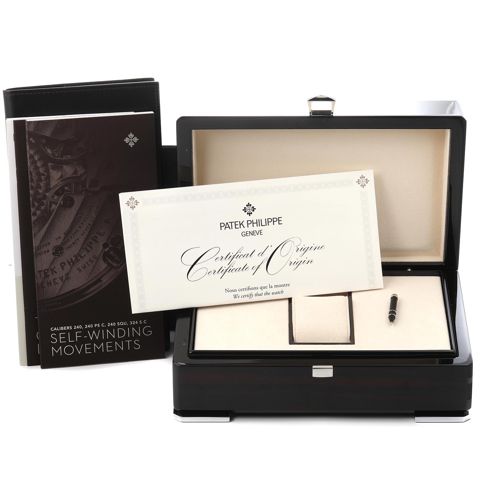 The image shows a Patek Philippe Calatrava 6006G-001 Men's White Gold Black Dial 6006G-001 Men's White Gold Black Dial watch box, certificate, booklet, and pen from a frontal angle.