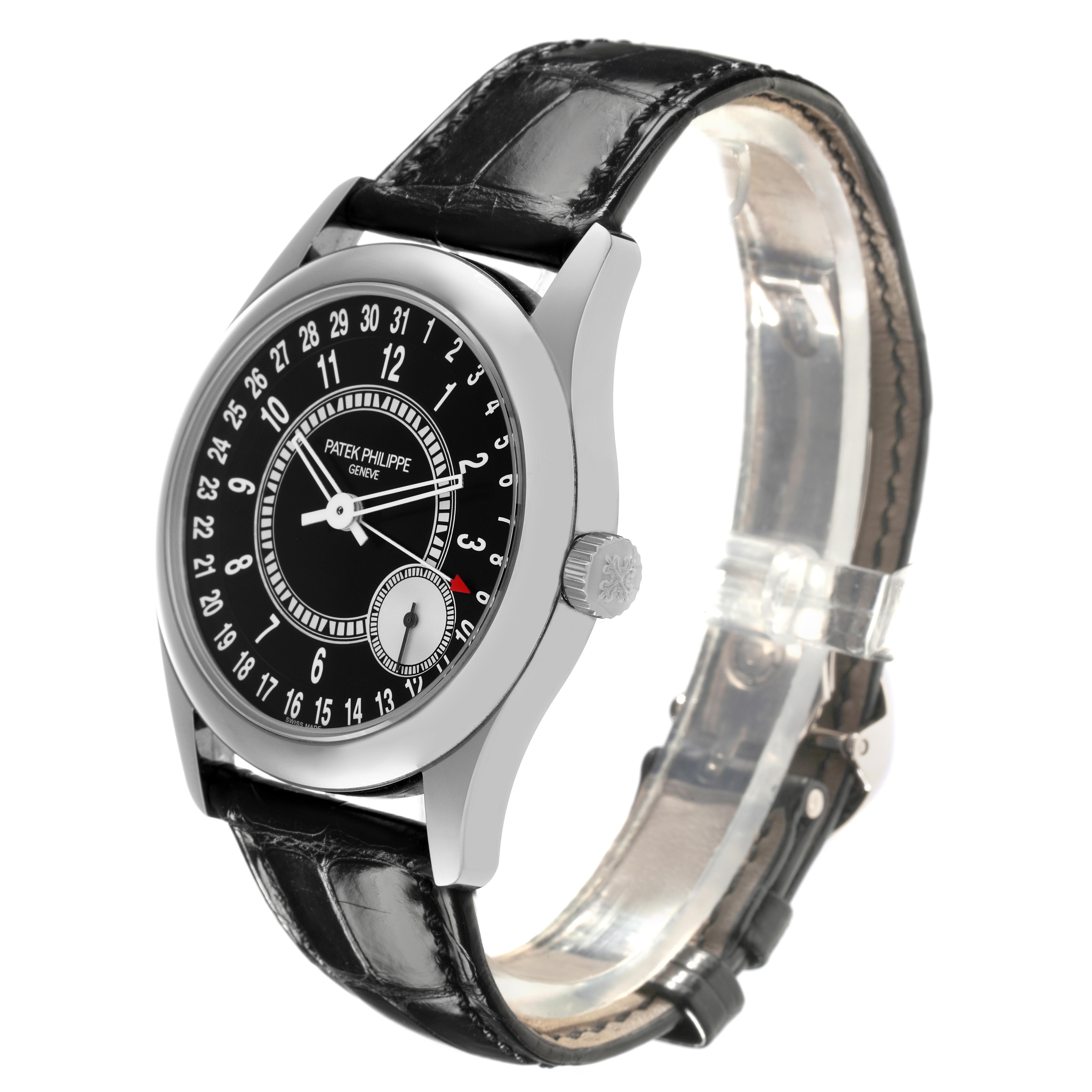 The Patek Philippe Calatrava 6006G-001 Men's White Gold Black Dial 6006G-001 Men's White Gold Black Dial watch is shown at a slight angle, highlighting the dial, bezel, crown, and leather strap.