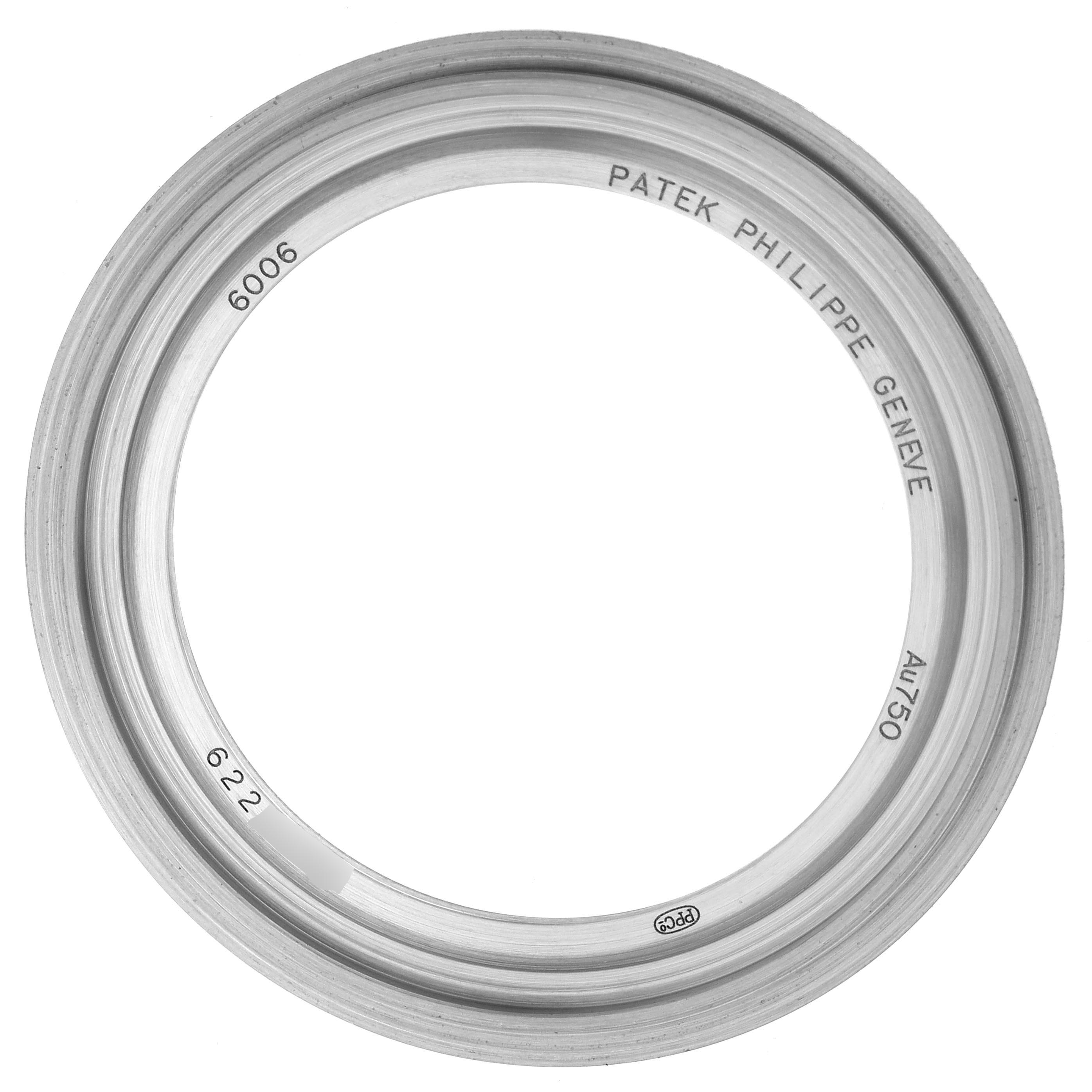 The image shows the bezel of a Patek Philippe Calatrava 6006G-001 Men's White Gold Black Dial 6006G-001 Men's White Gold Black Dial model, viewed directly from above.