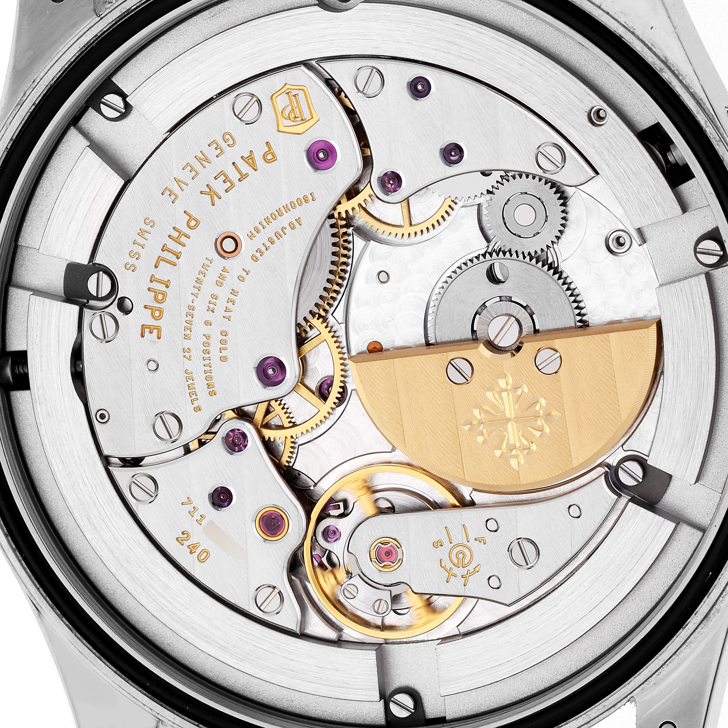 The image shows the movement of a Patek Philippe Calatrava 6006G-001 Men's White Gold Black Dial 6006G-001 Men's White Gold Black Dial watch from a rear angle, highlighting gears, screws, and the rotor.