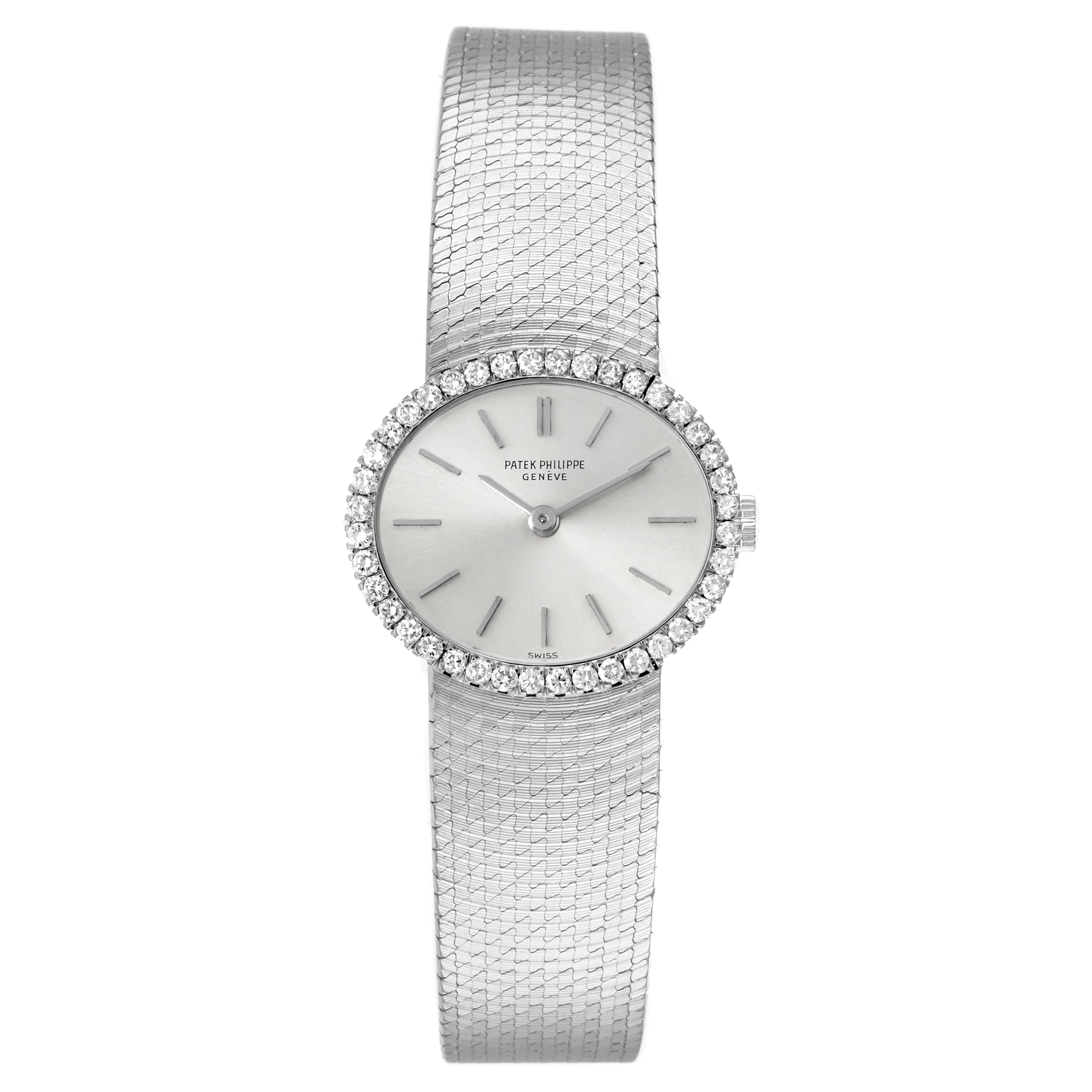 The image shows a frontal view of the Patek Philippe Golden Ellipse 3350 Women
s White Gold Silver Dial 3350 Women
s White Gold Silver Dial, highlighting its dial, diamond bezel, and silver mesh bracelet.