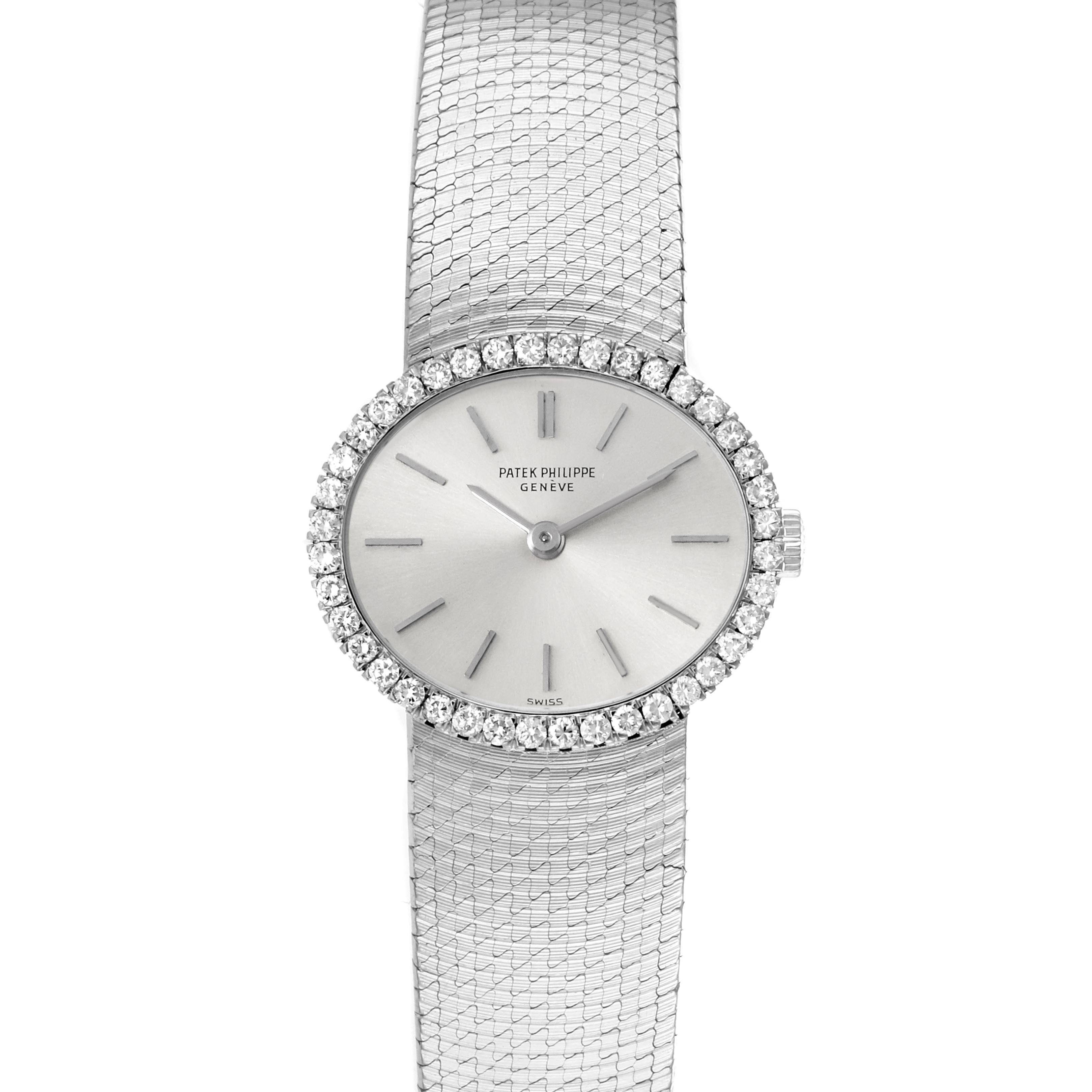 The Patek Philippe Golden Ellipse 3350 Women
s White Gold Silver Dial 3350 Women
s White Gold Silver Dial watch is shown from a top view, highlighting the dial, bezel, and mesh bracelet.