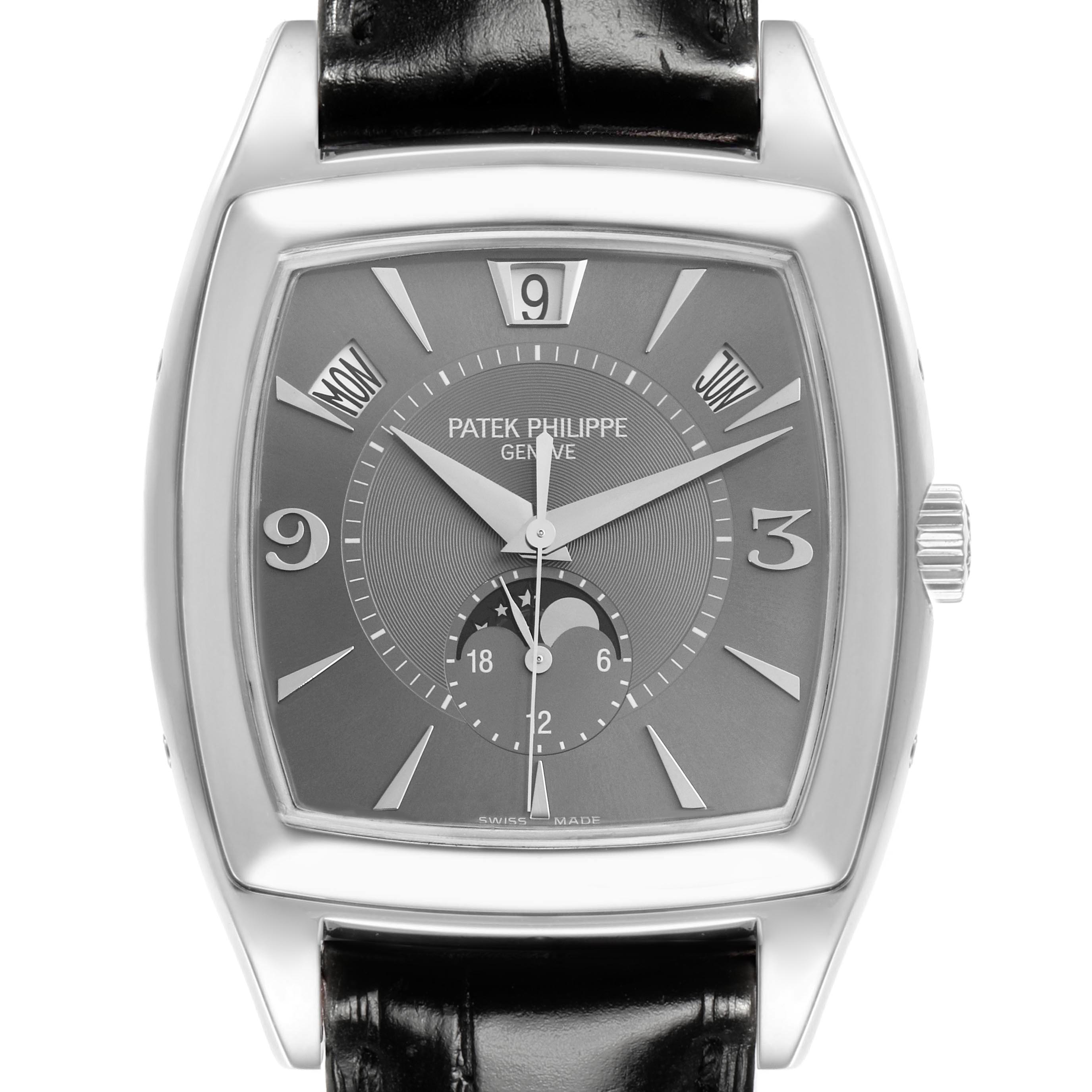 The Patek Philippe Gondolo 5135G-010 Men
s White Gold Grey Dial 5135G-010 Men
s White Gold Grey Dial watch is shown from the front, highlighting the dial, numerals, hands, and leather strap.