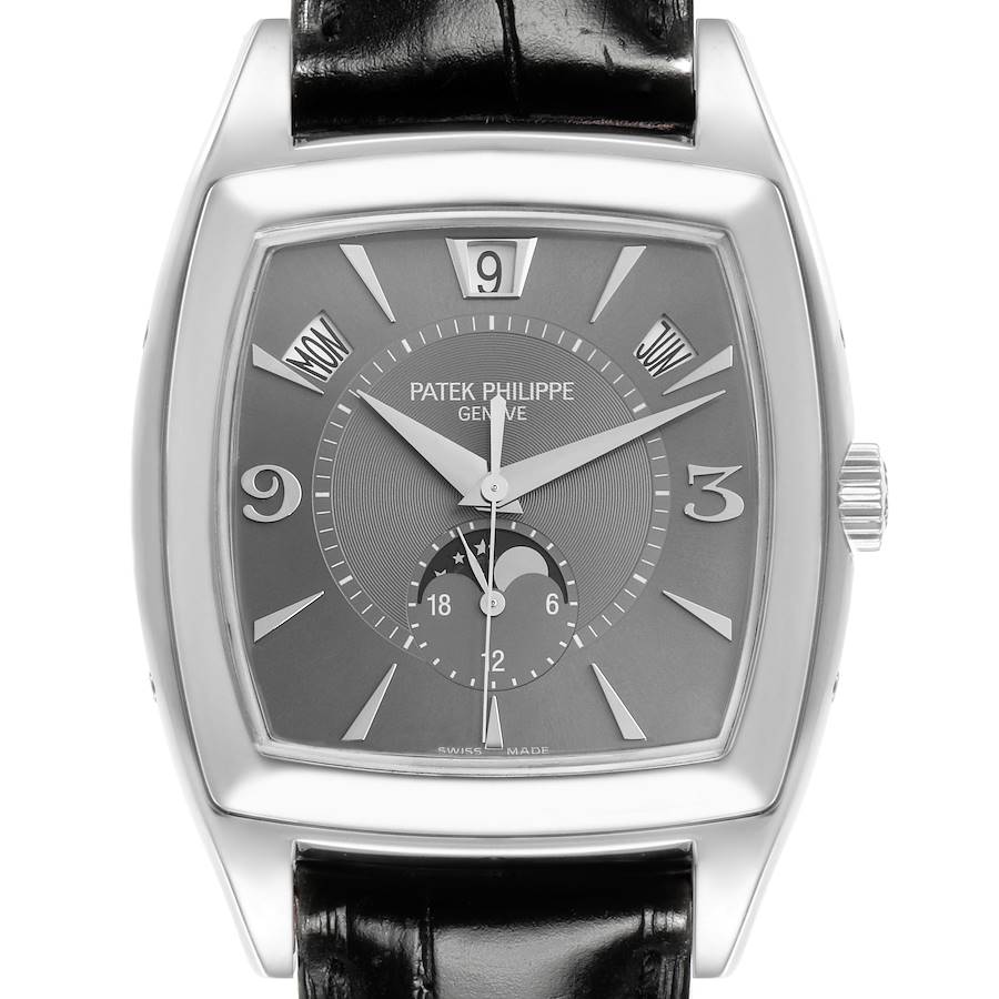 The Patek Philippe Gondolo watch is shown from the front, highlighting the dial, numerals, hands, and leather strap.