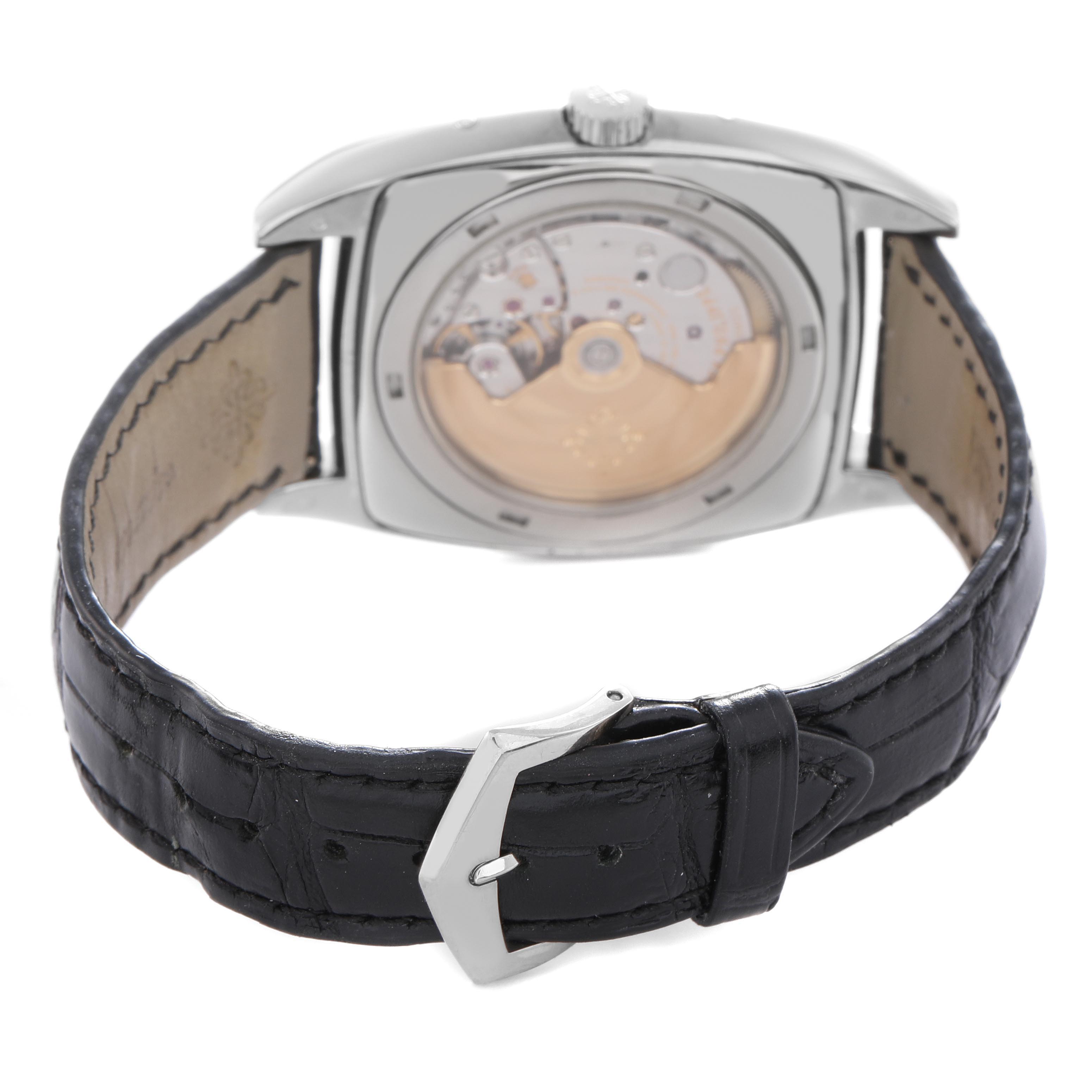 The image shows the back view of a Patek Philippe Gondolo 5135G-010 Men
s White Gold Grey Dial 5135G-010 Men
s White Gold Grey Dial watch, highlighting the case back and leather strap with a buckle.