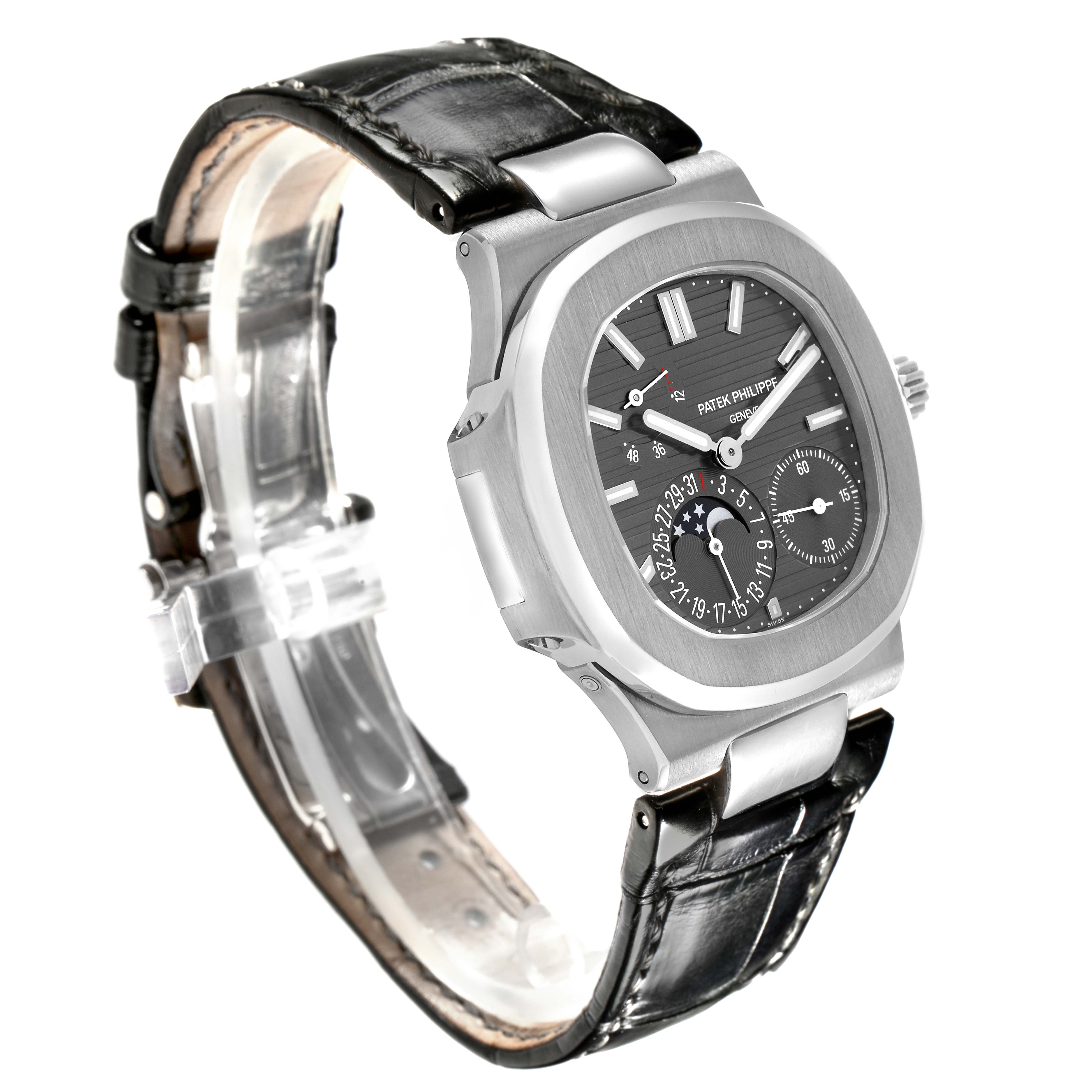 The Patek Philippe Nautilus 5712G-001 Men
s White Gold Grey Dial 5712G-001 Men
s White Gold Grey Dial watch is shown at a three-quarter angle, highlighting the dial, case, and leather strap.