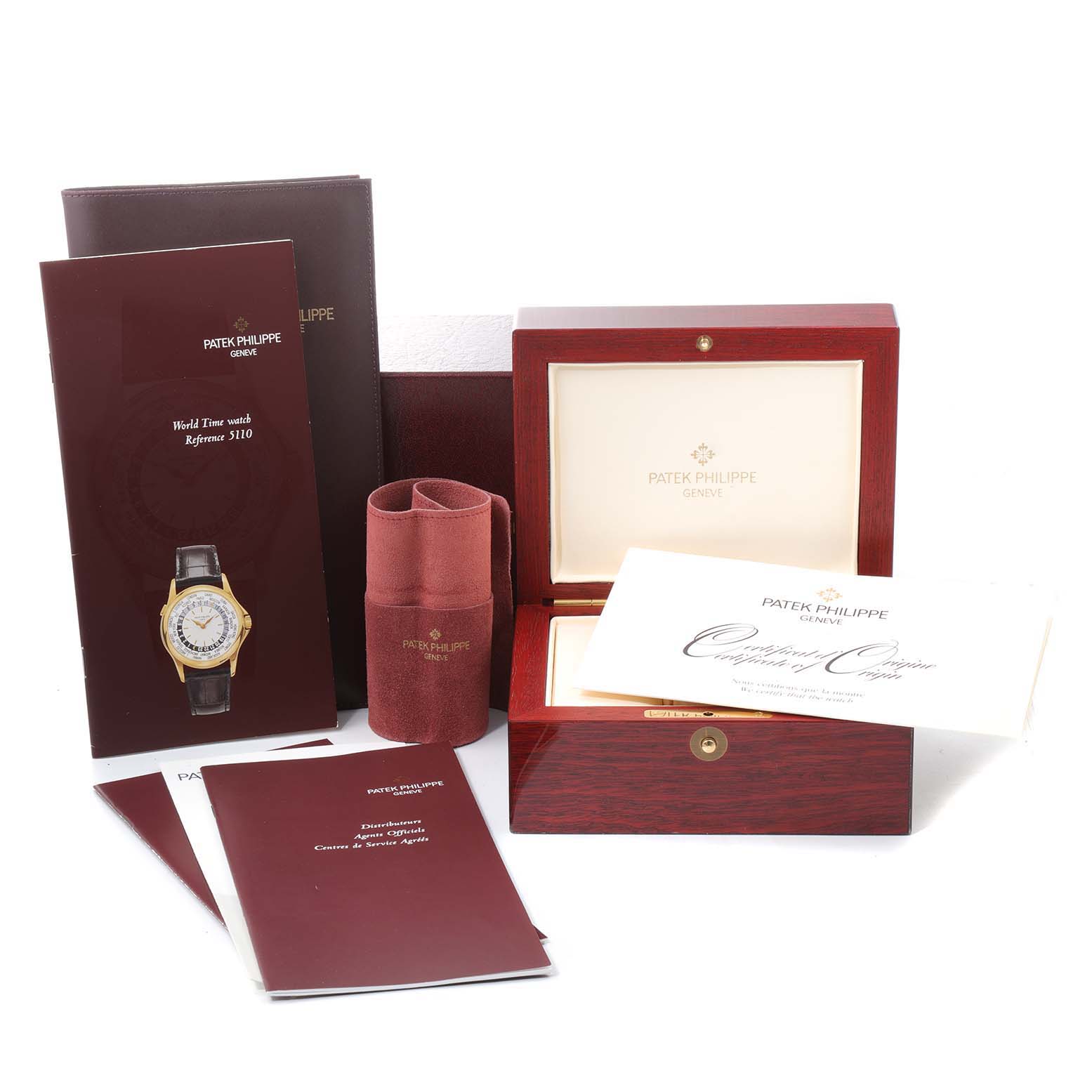 The image shows the box, papers, and accessories for the Patek Philippe 5110G Men's White Gold Silver Dial 5110G Men's White Gold Silver Dial World Time Automatic White Gold Mens Watch 5110.