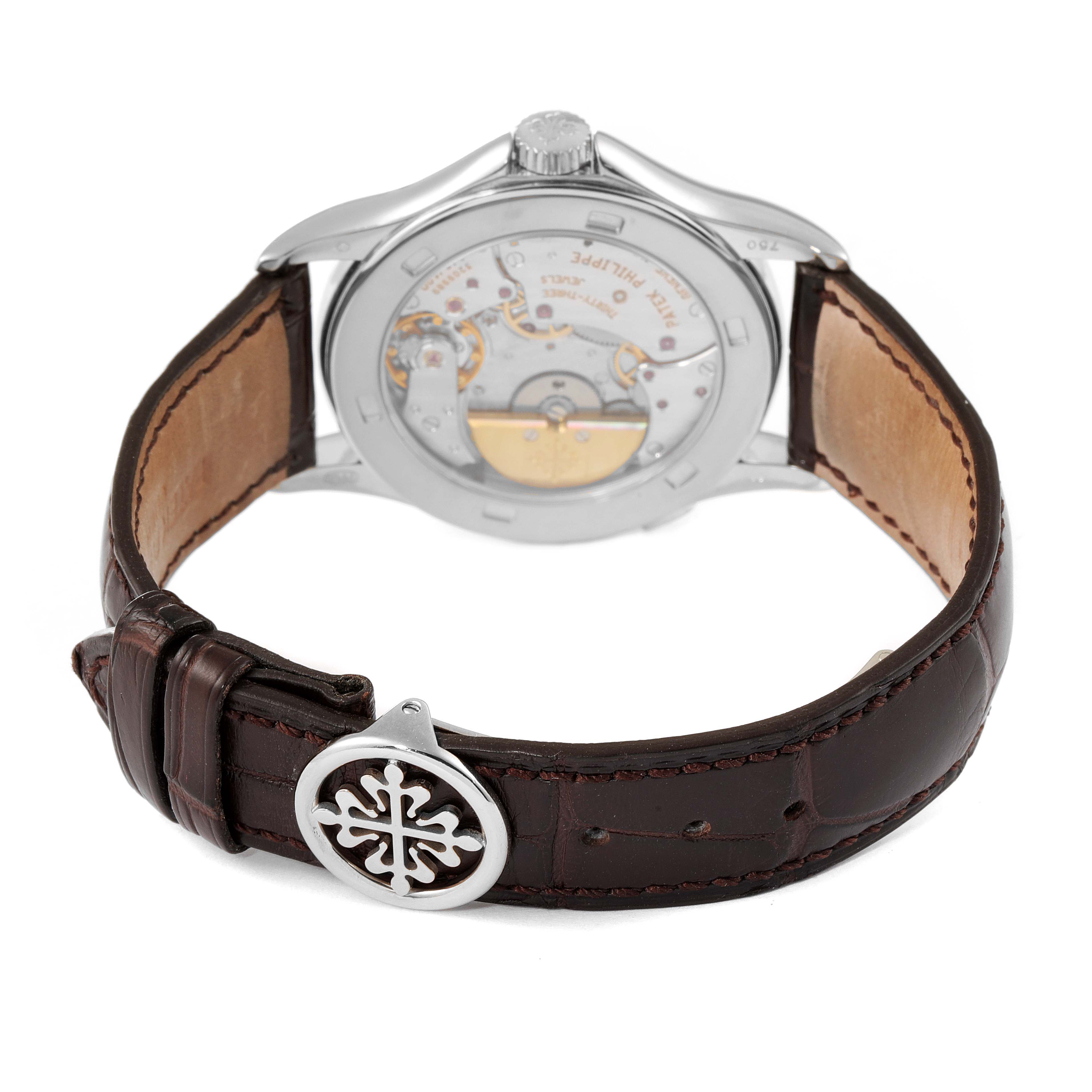 The image shows the back view of the Patek Philippe 5110G Men's White Gold Silver Dial 5110G Men's White Gold Silver Dial World Time Automatic White Gold Men's Watch 5110, highlighting the movement and leather strap.