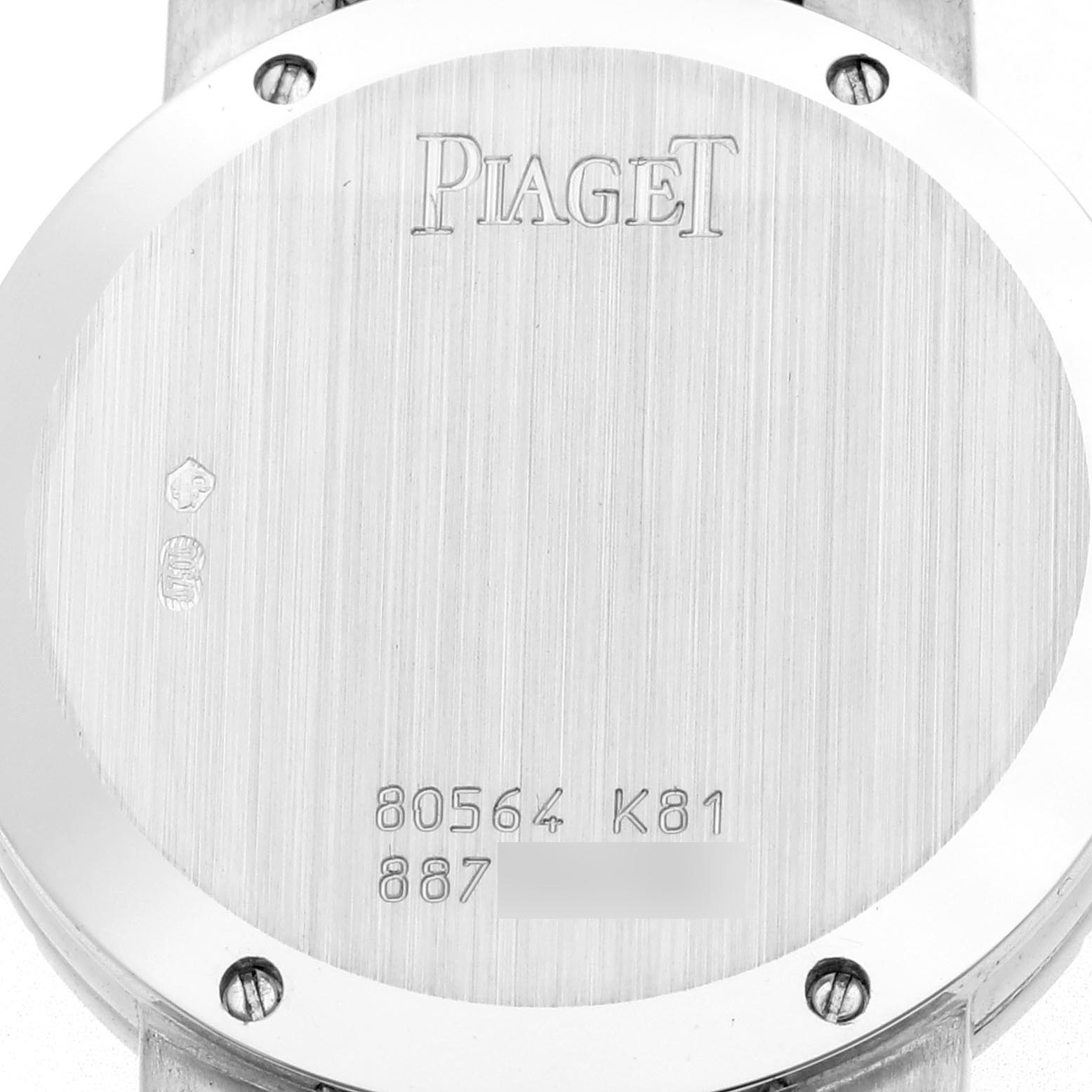 The image shows the back of a Piaget 80564K81 Women
s White Gold Silver Dial 80564K81 Women
s White Gold Silver Dial Dancer White Gold Diamond Ladies Watch 80564, highlighting the engraved details and screws.
